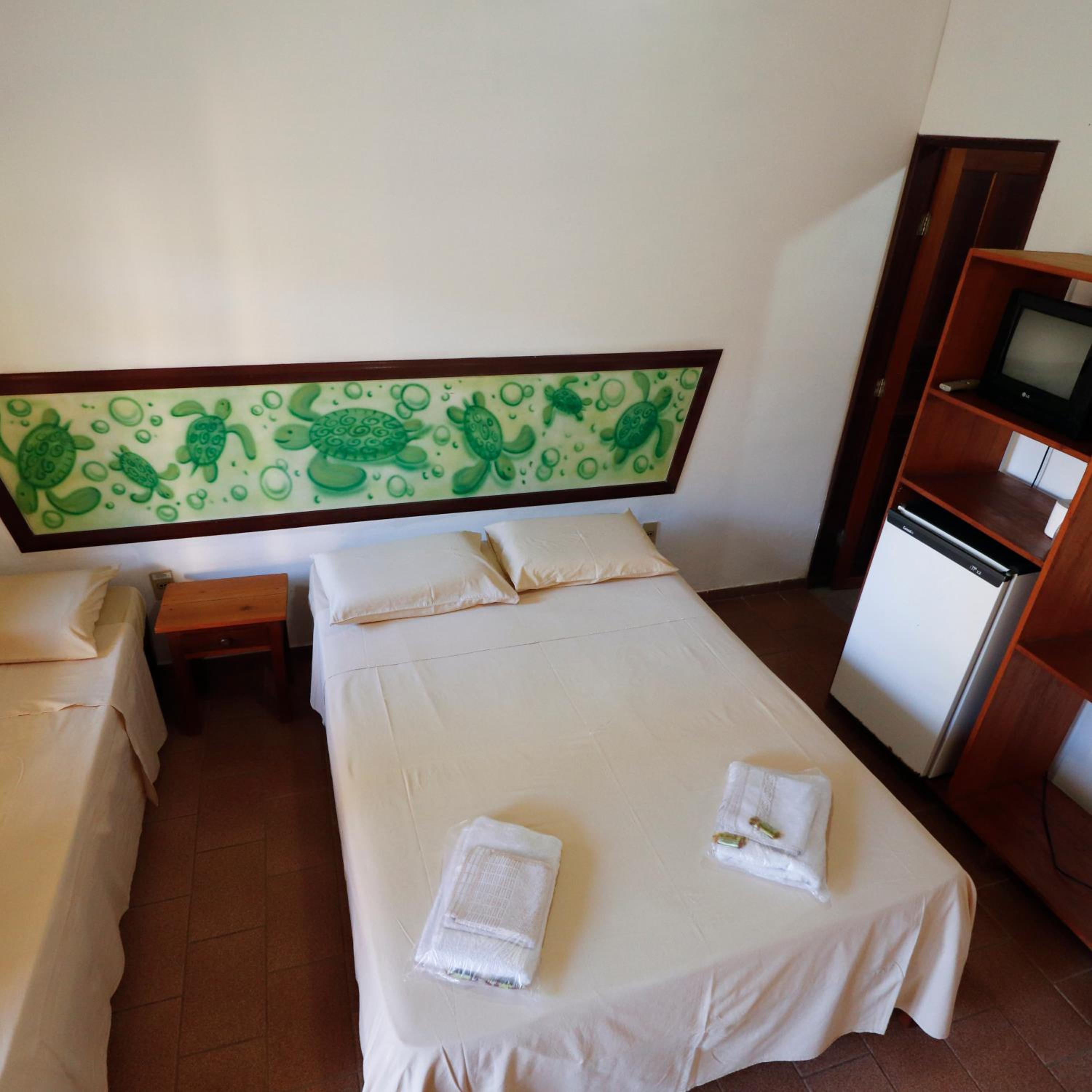 Economy Triple Room photo 2