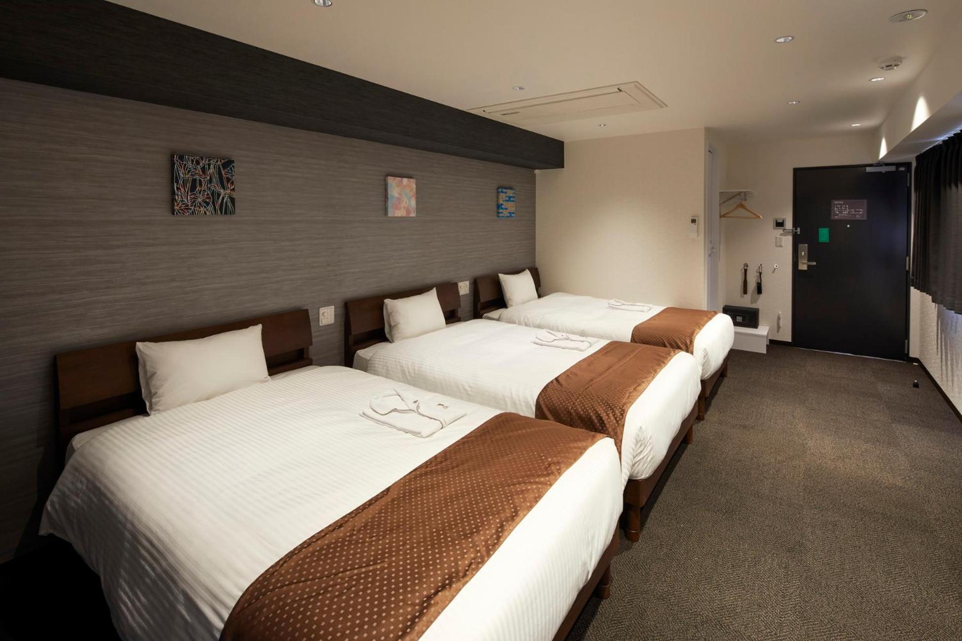 Deluxe Triple Room - Photo 1