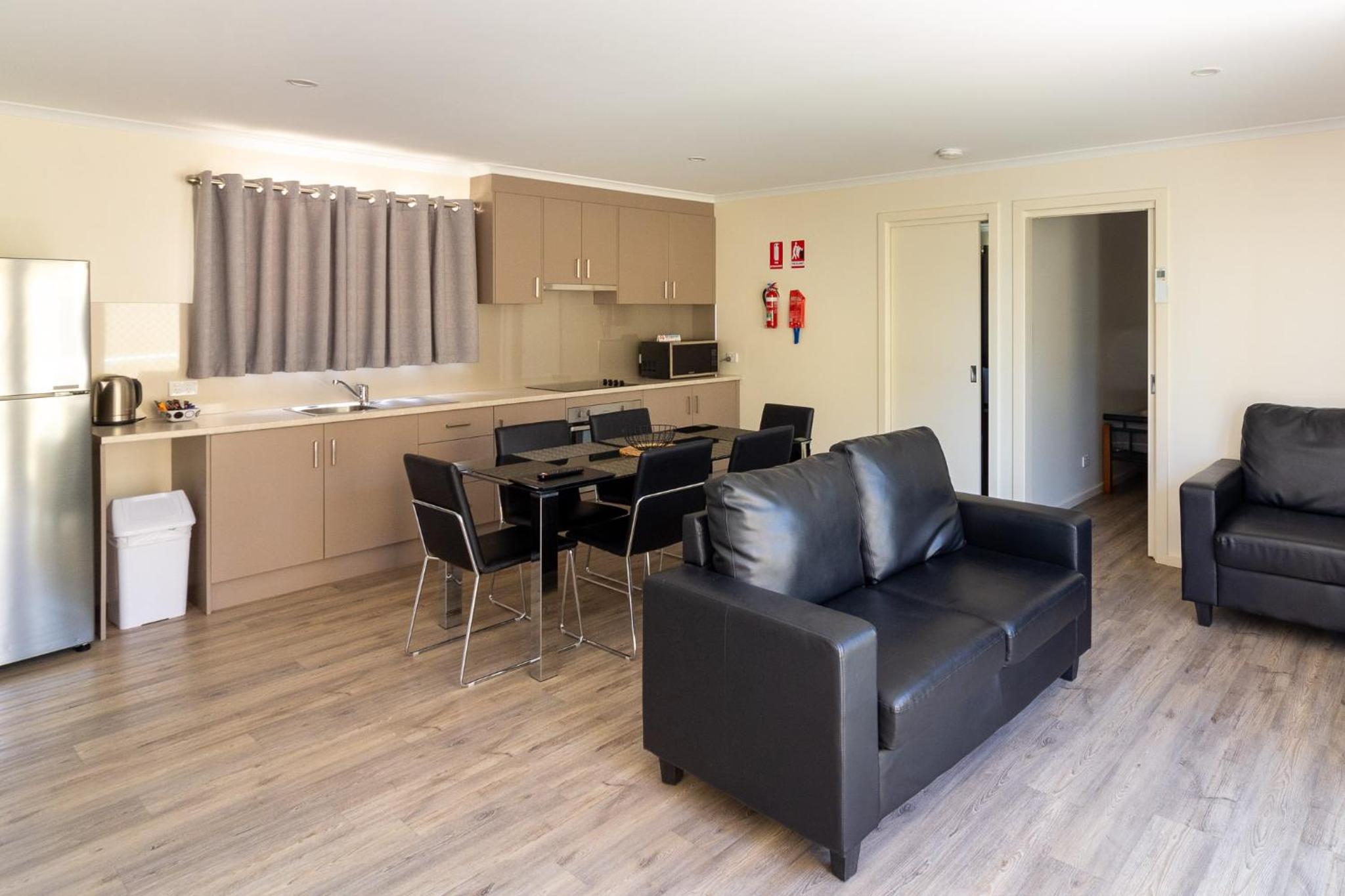 Three-Bedroom Apartment - Photo 2