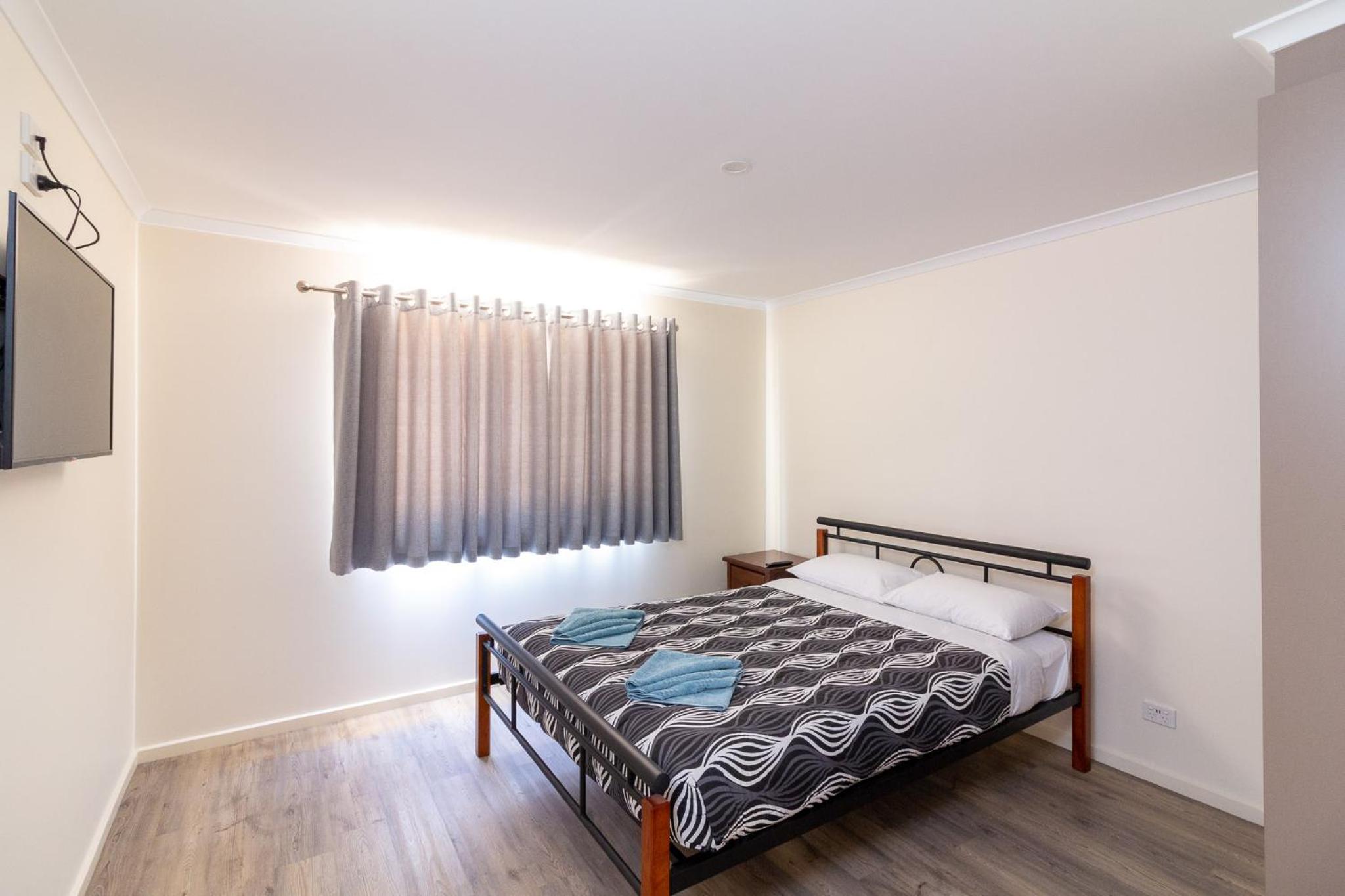 Three-Bedroom Apartment - Photo 7