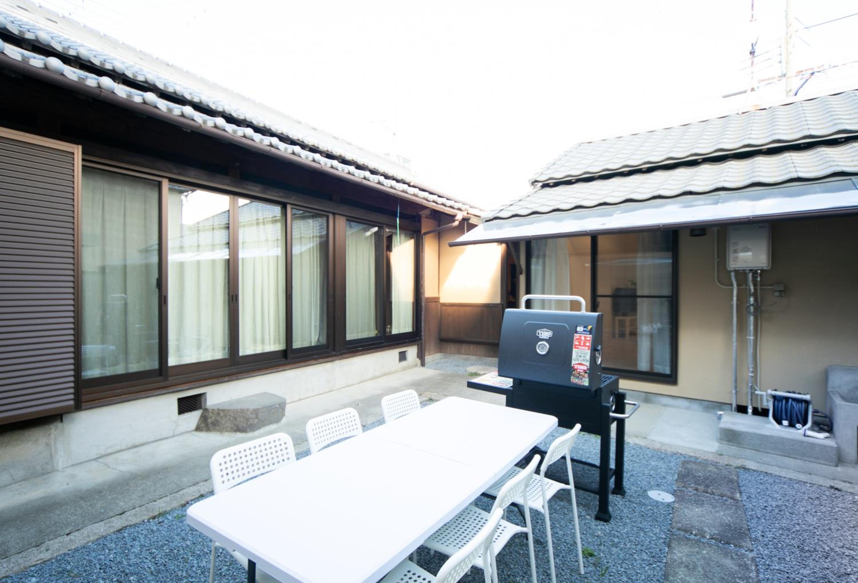 Four-Bedroom House - Photo 32