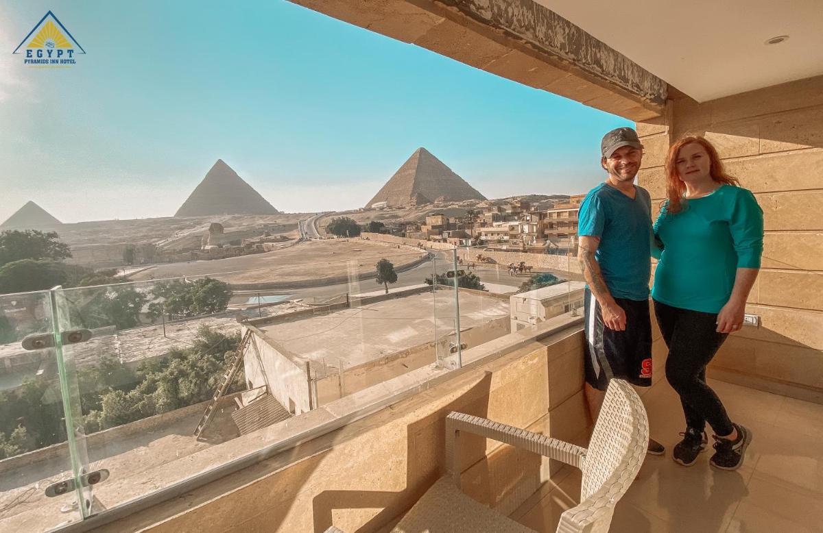 Family Room with Balcony and Pyramid View - Photo 1