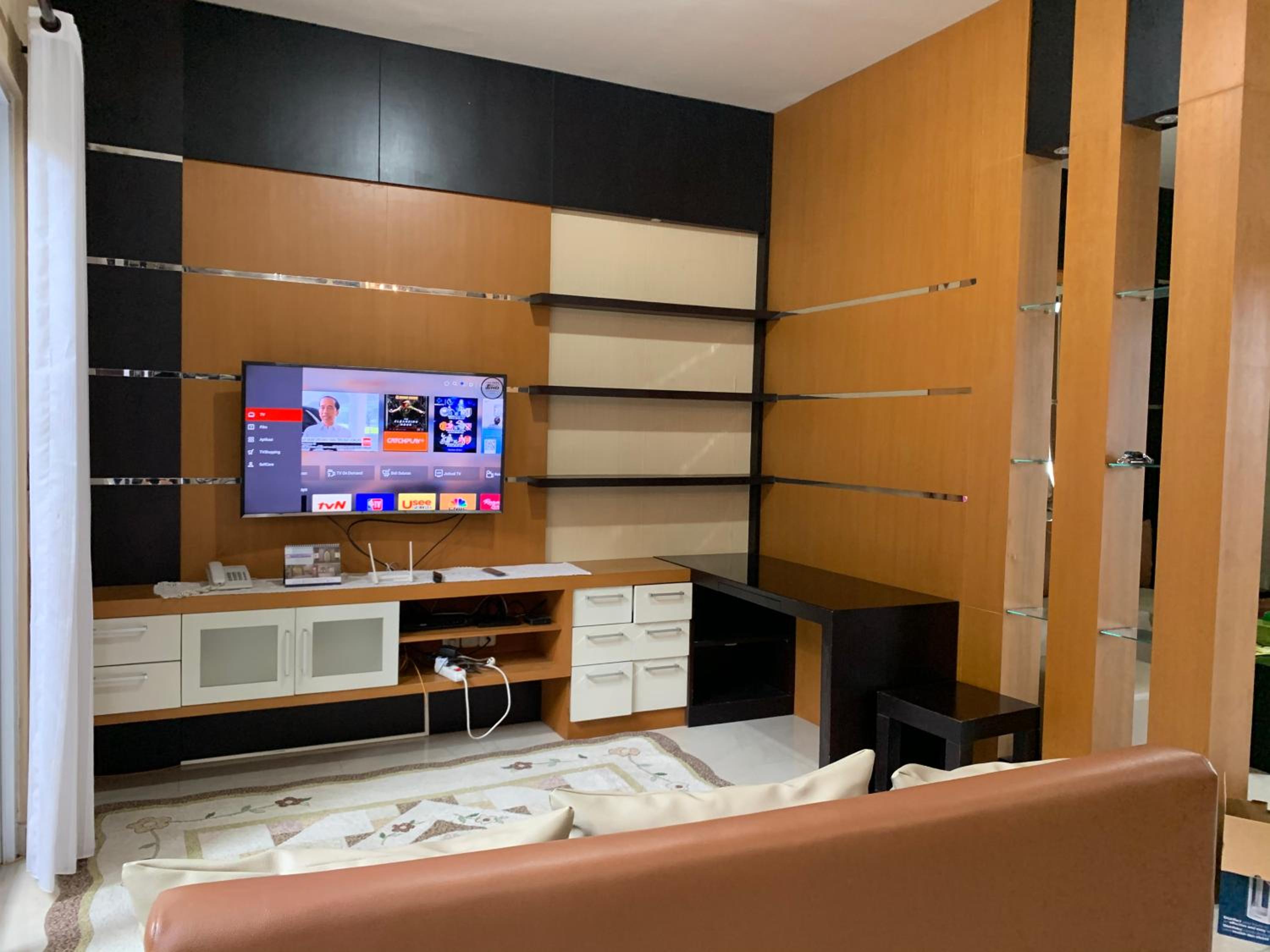 Three-Bedroom House - Photo 21