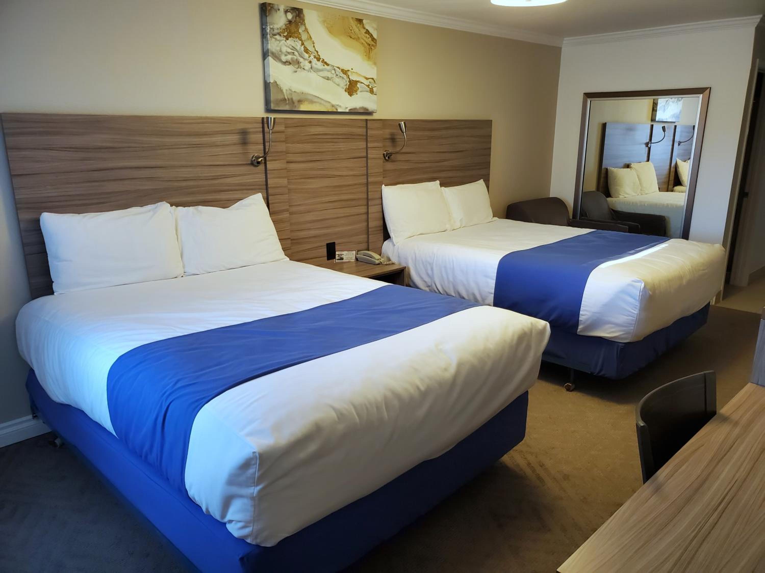 Standard Queen Room with Two Queen Beds - Photo 1