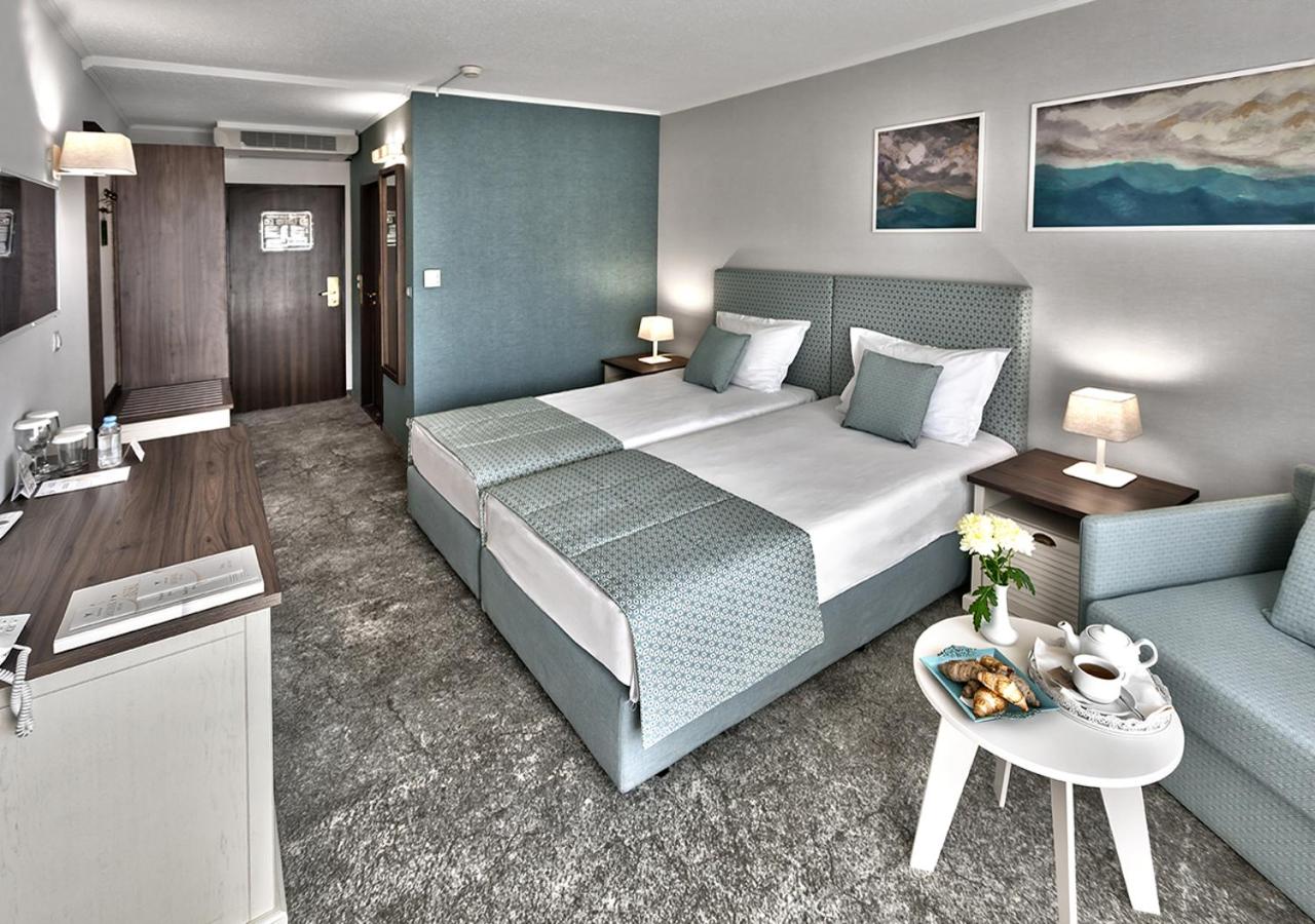 Double or Twin Room (2 Adults + 1 Child from 4 years to 11.99 years old)