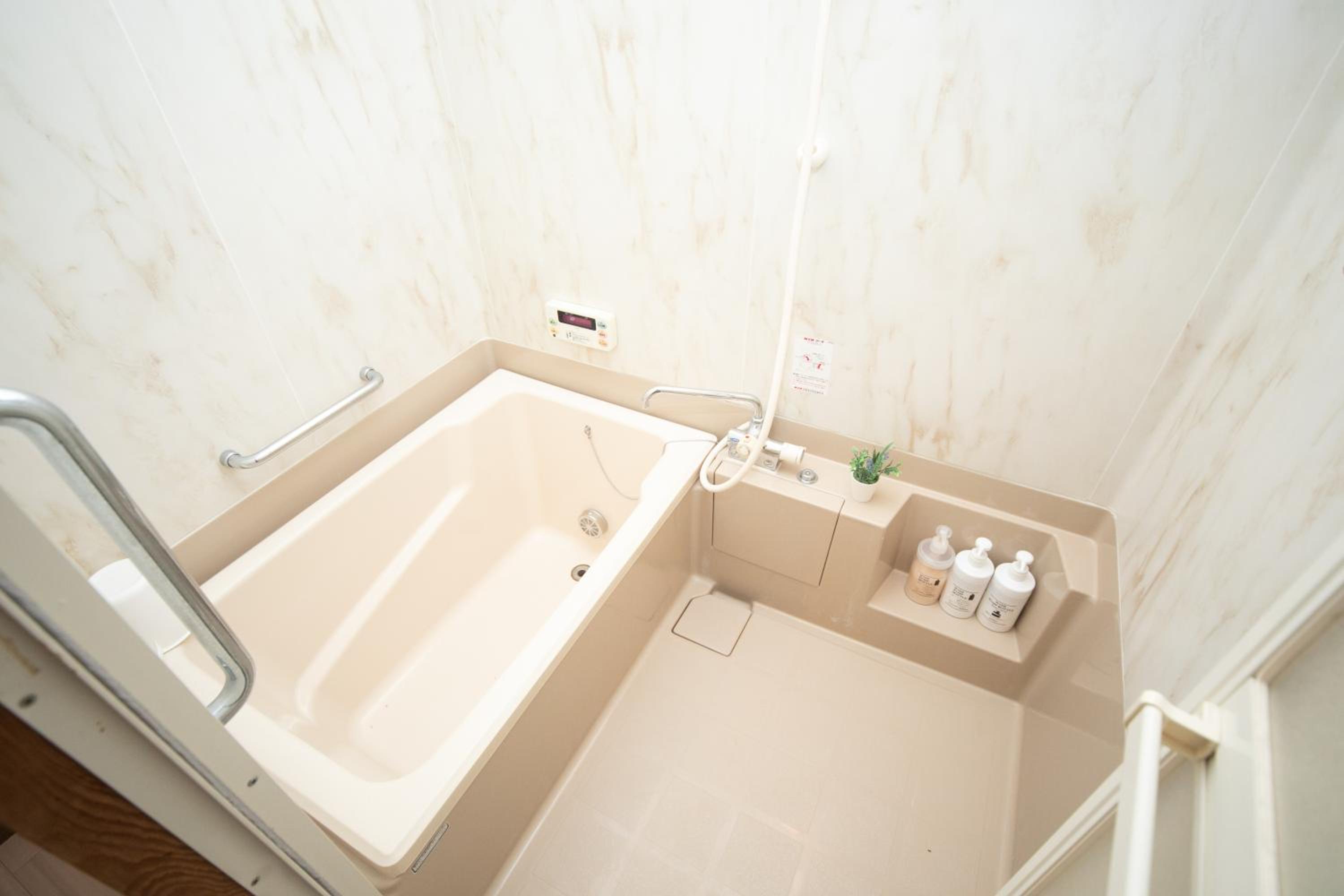 Three-Bedroom House - Photo 34