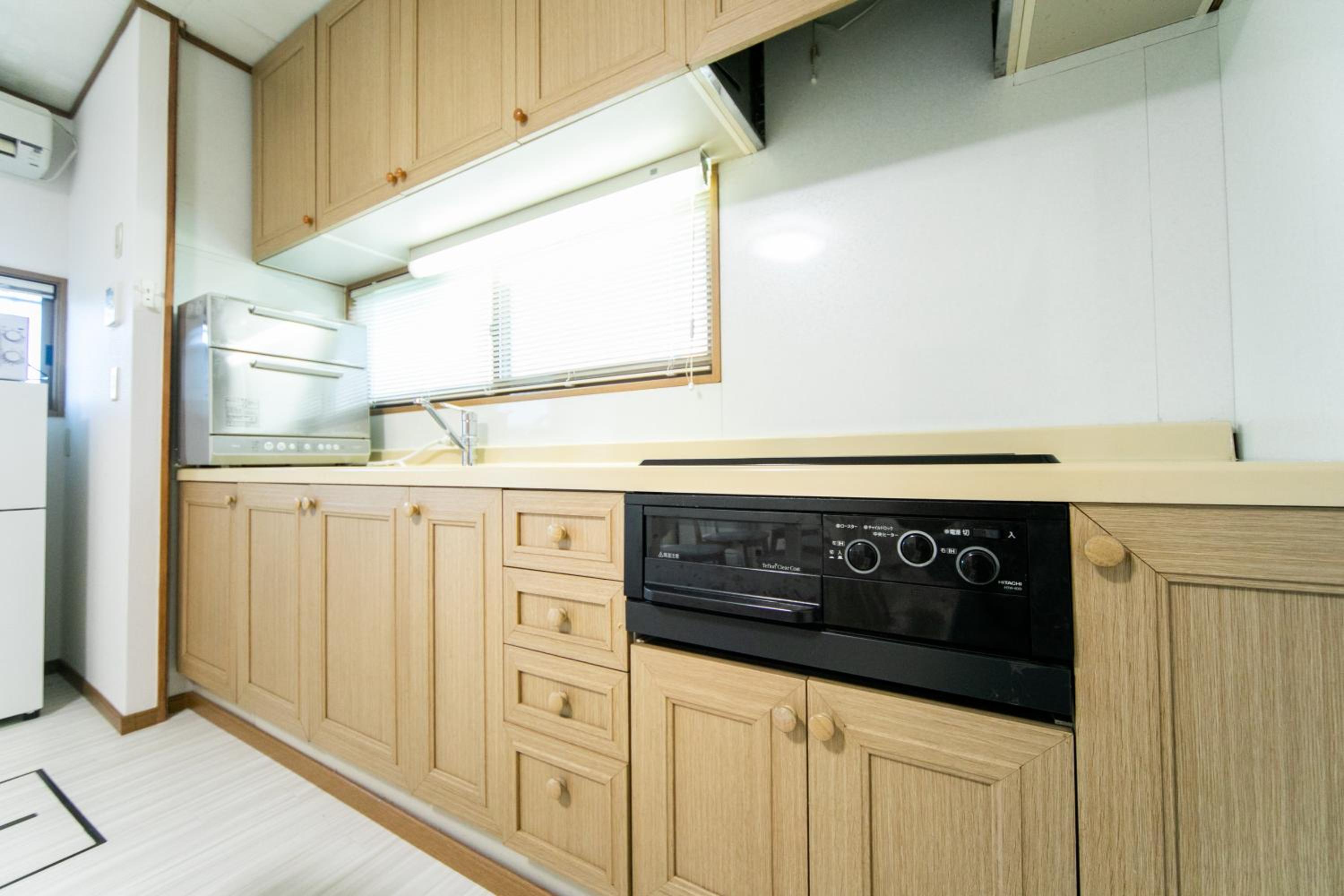 Three-Bedroom House - Photo 28