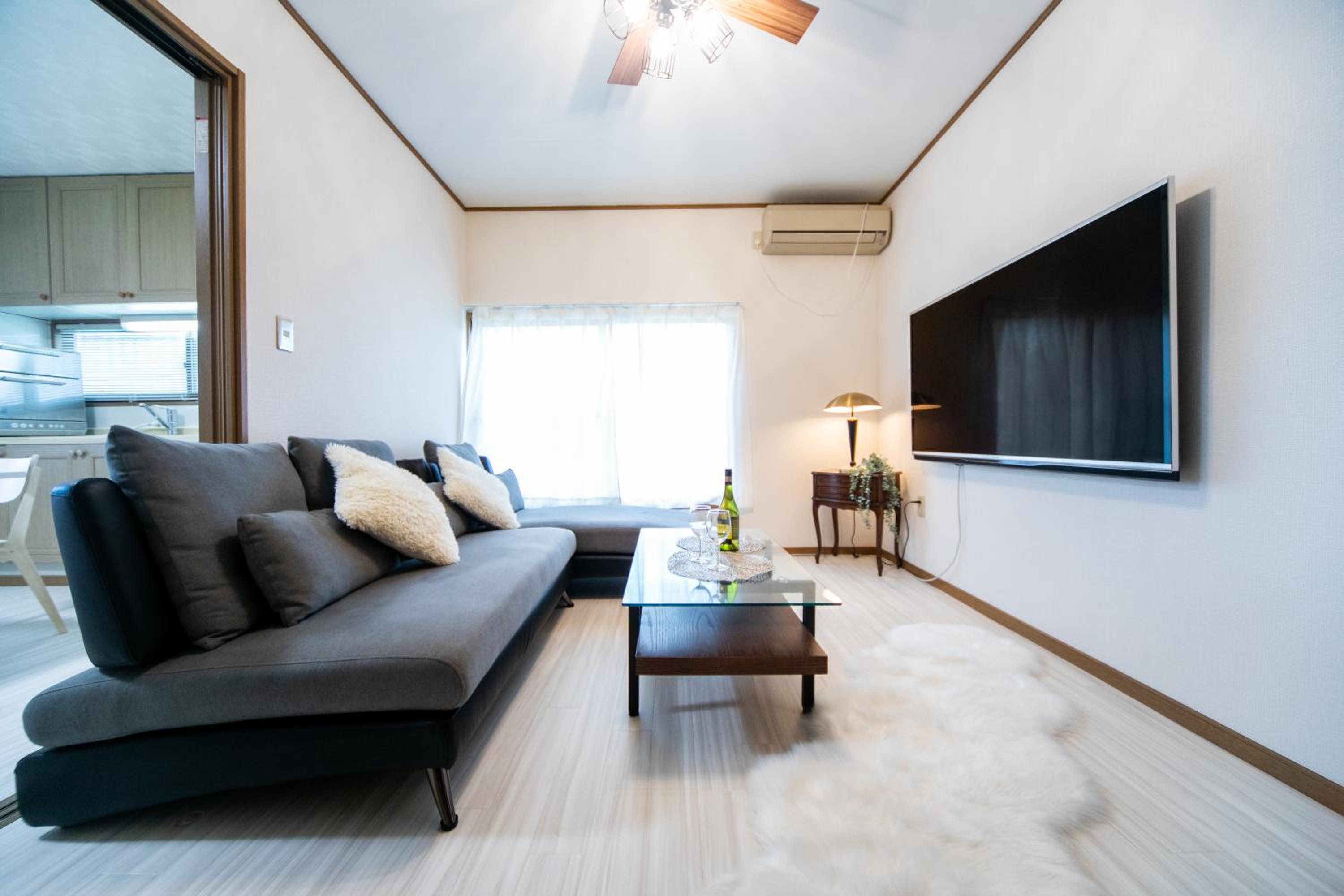 Three-Bedroom House - Photo 27