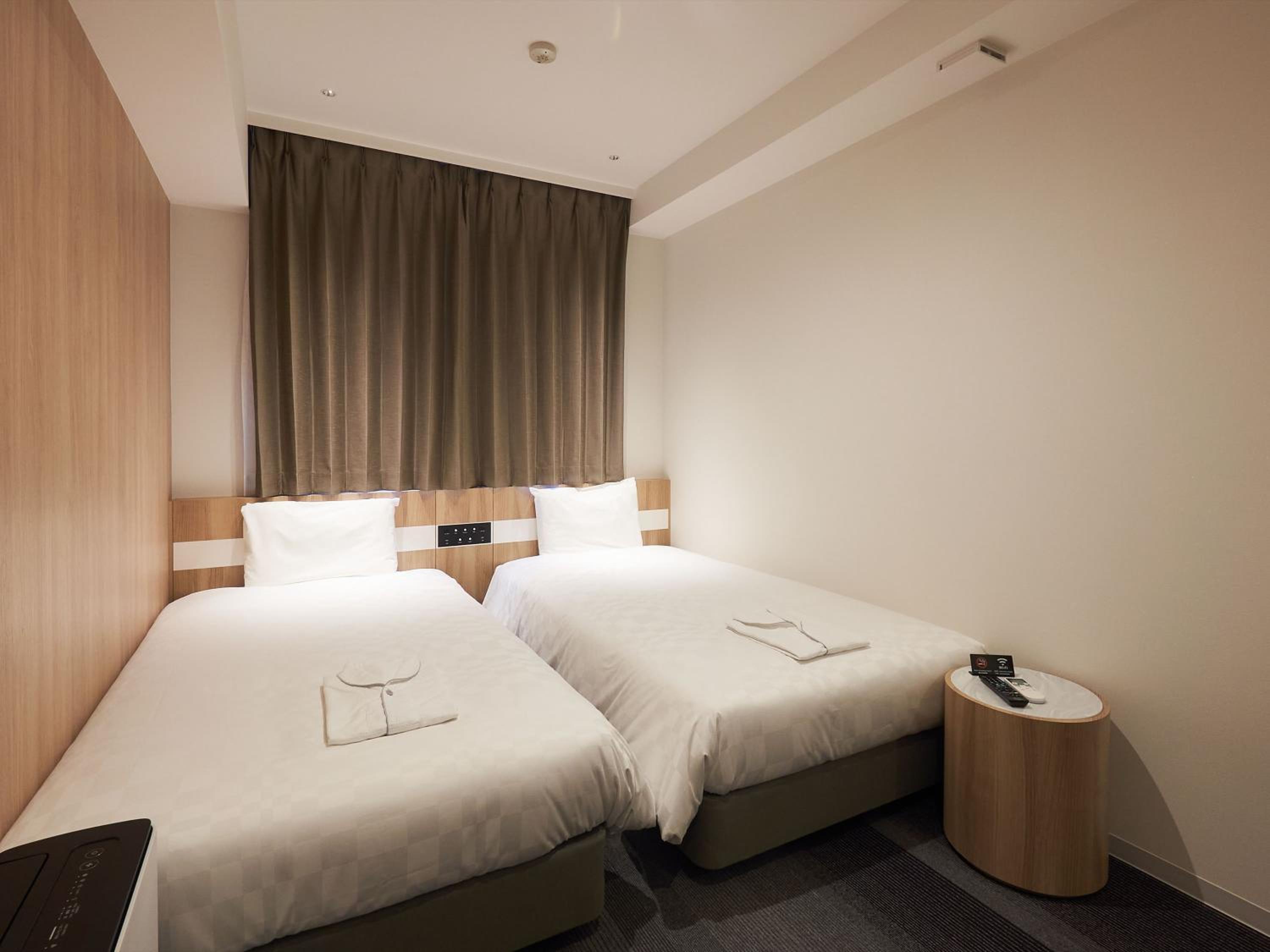 Twin Room - Photo 16