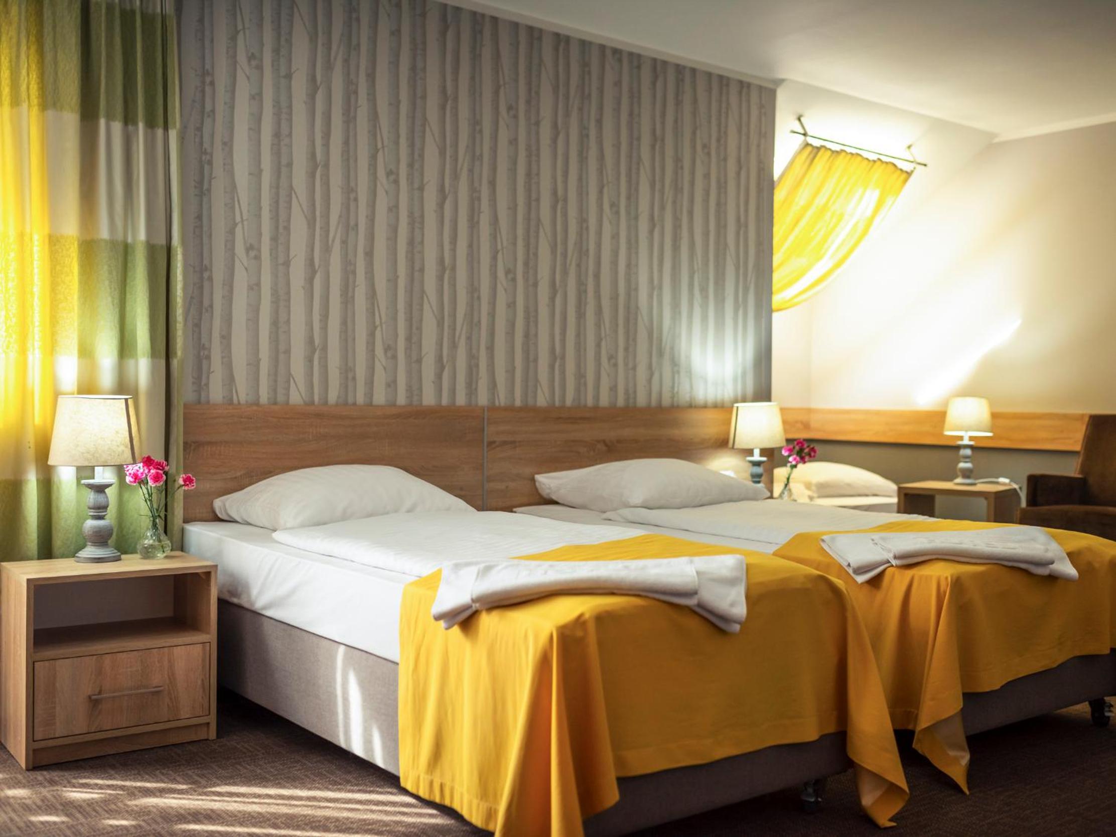 Deluxe Room with Balcony - Photo 3