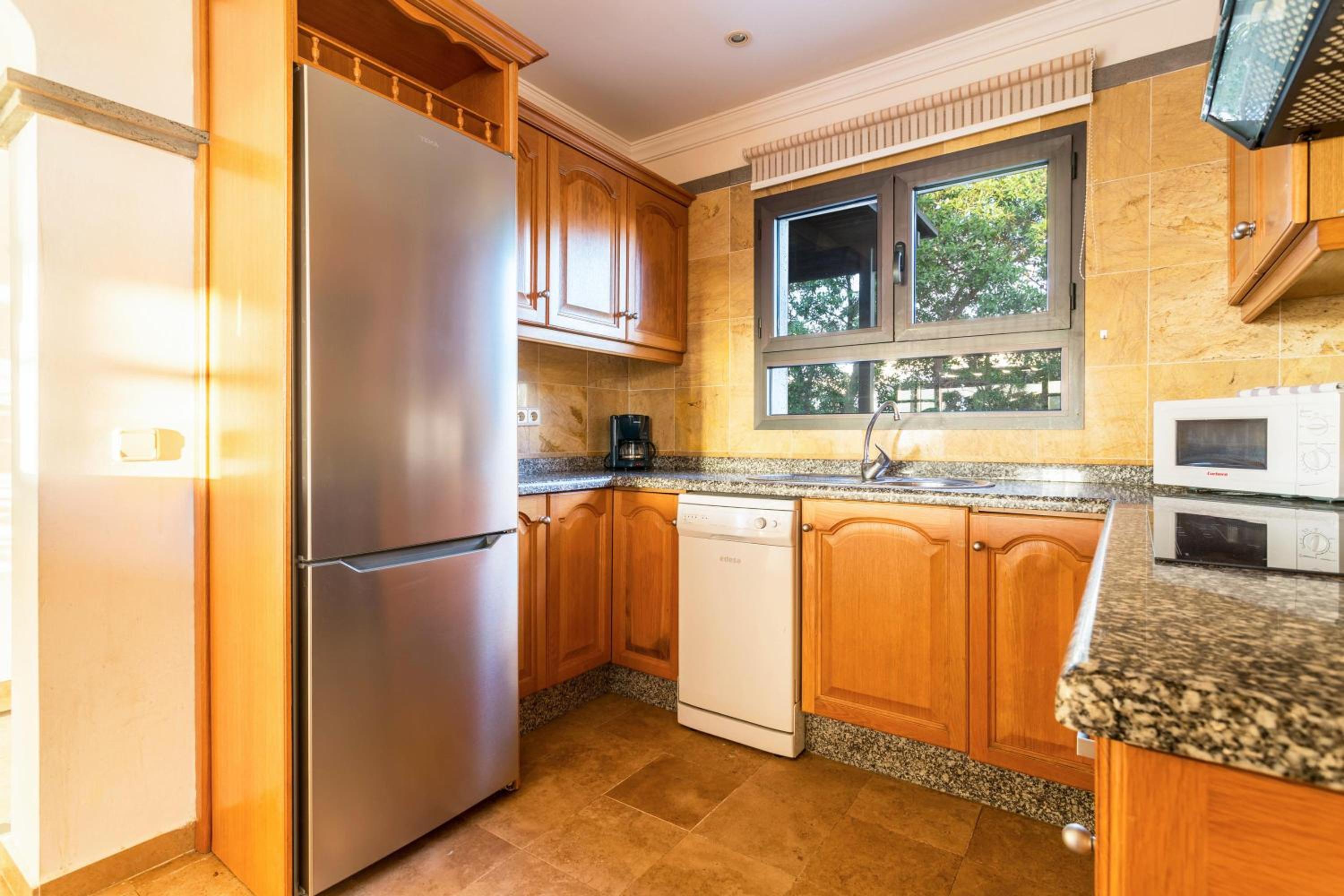 Three-Bedroom House - Photo 9