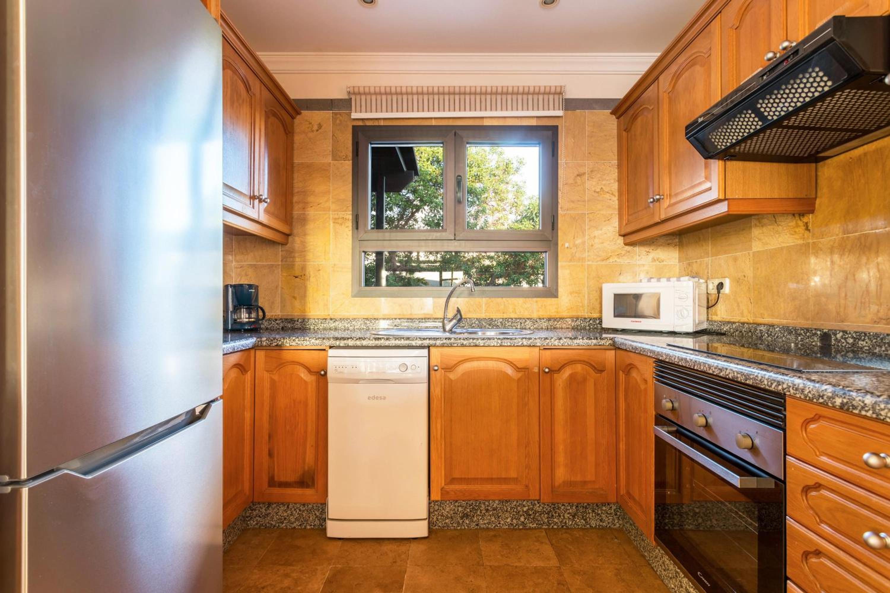 Three-Bedroom House - Photo 24