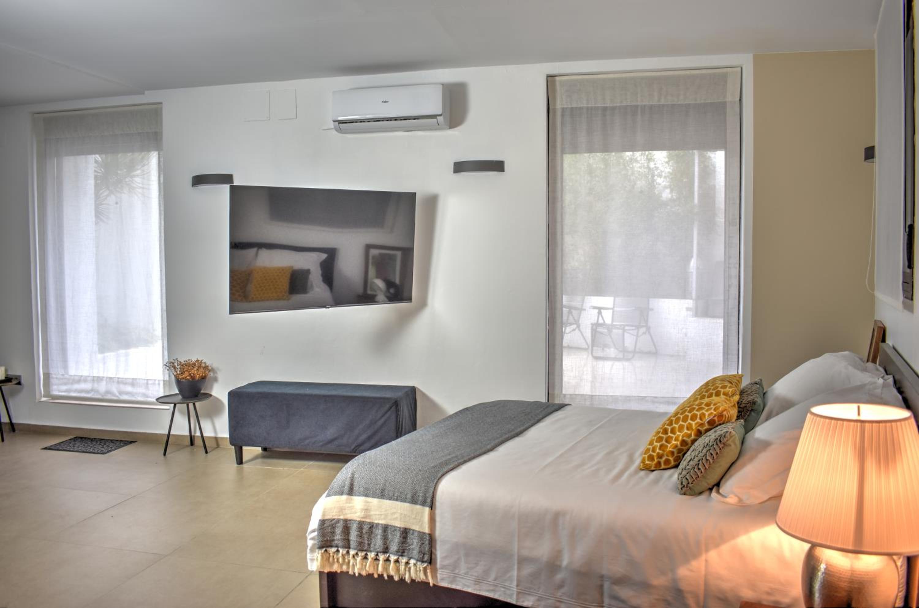 Apartamento con patio privado y spa al aire libre
