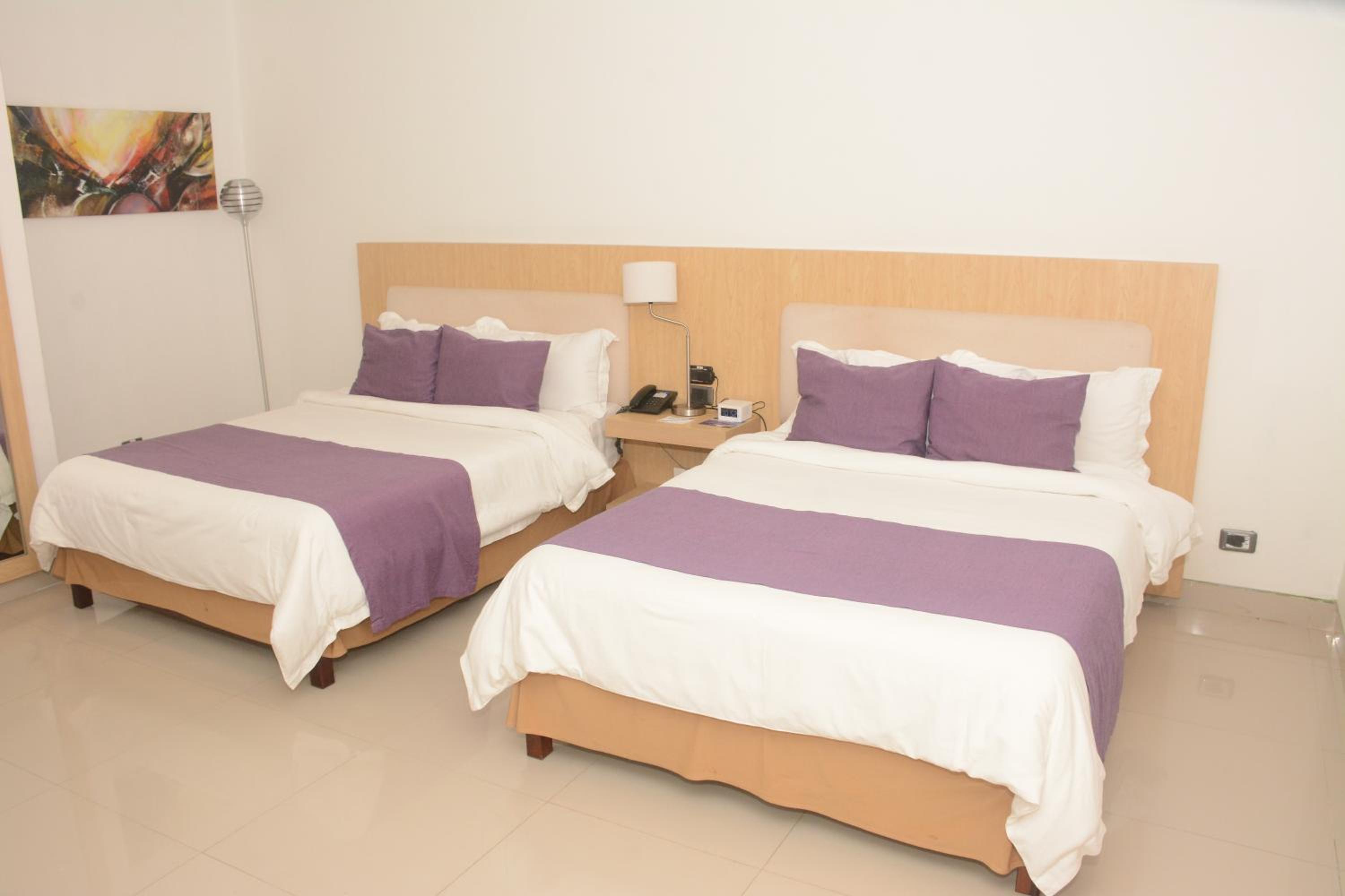 Double Room with Two Double Beds with City View - Non-Smoking photo 1