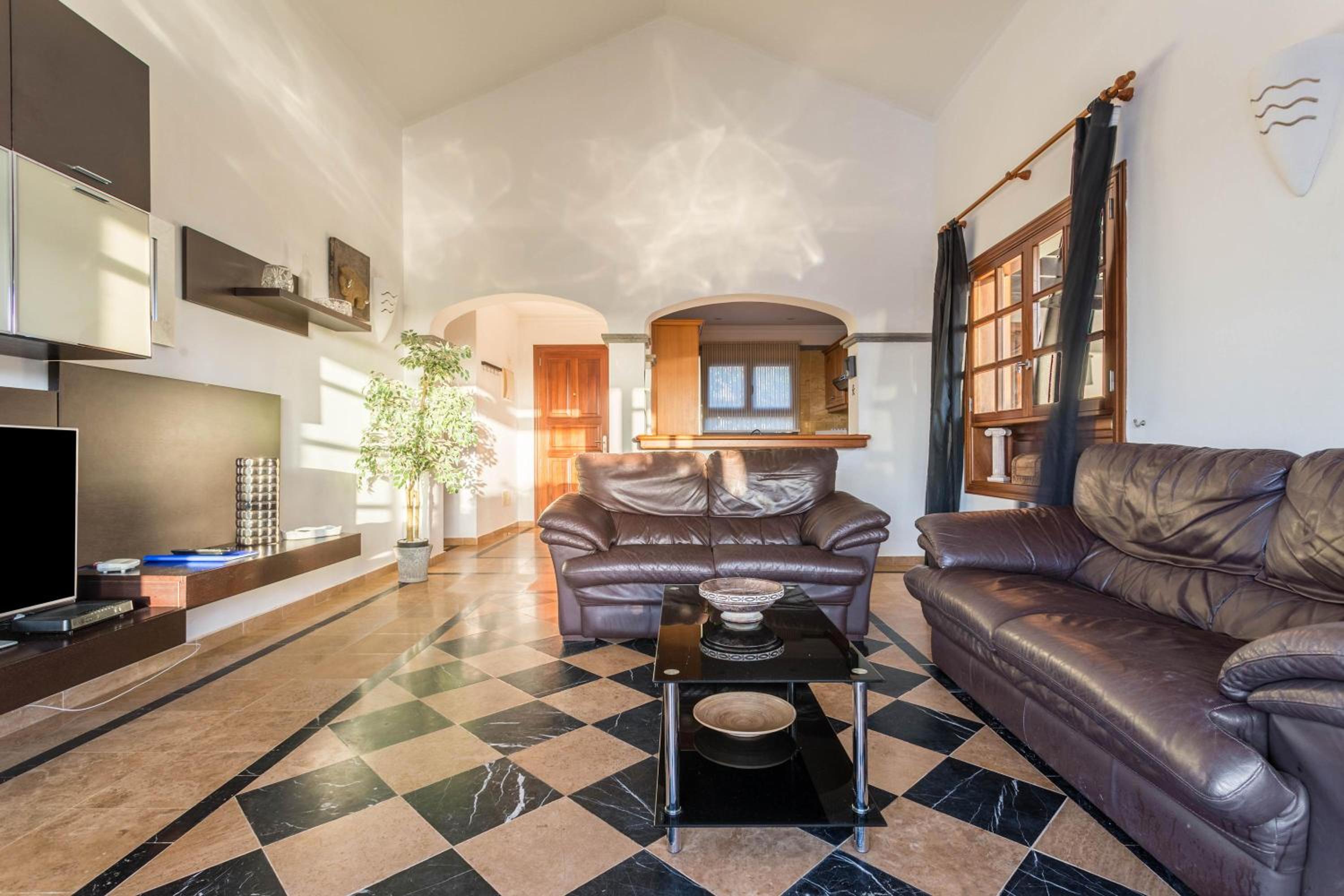 Three-Bedroom House - Photo 23