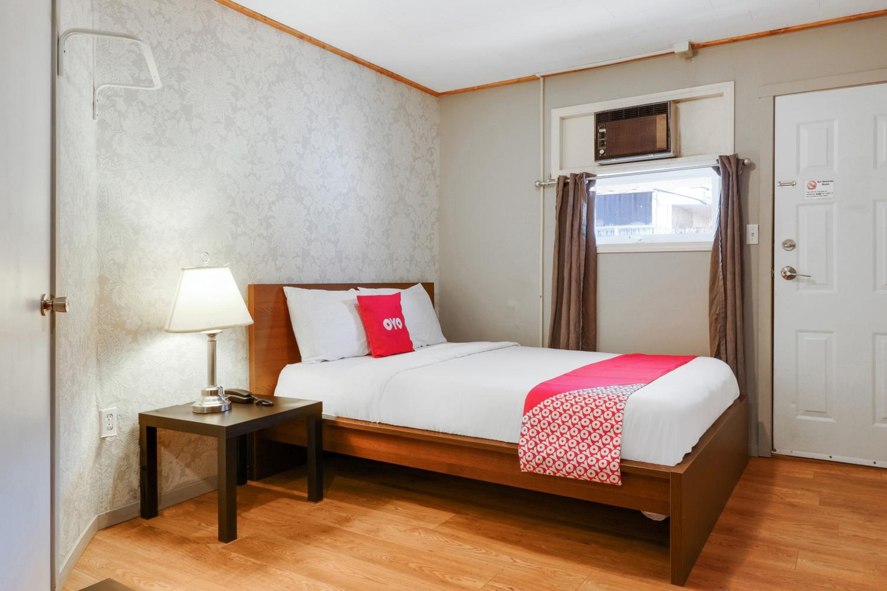 Deluxe Queen Room with Two Queen Beds - Photo 1