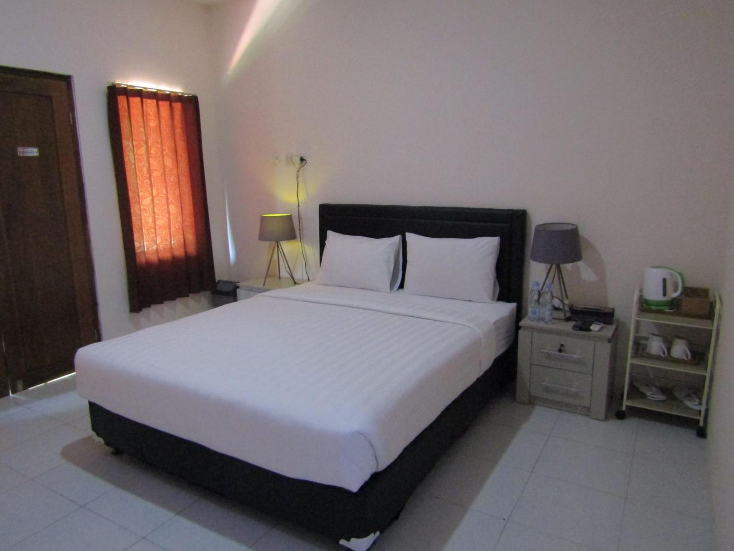 Deluxe Room - Photo 5