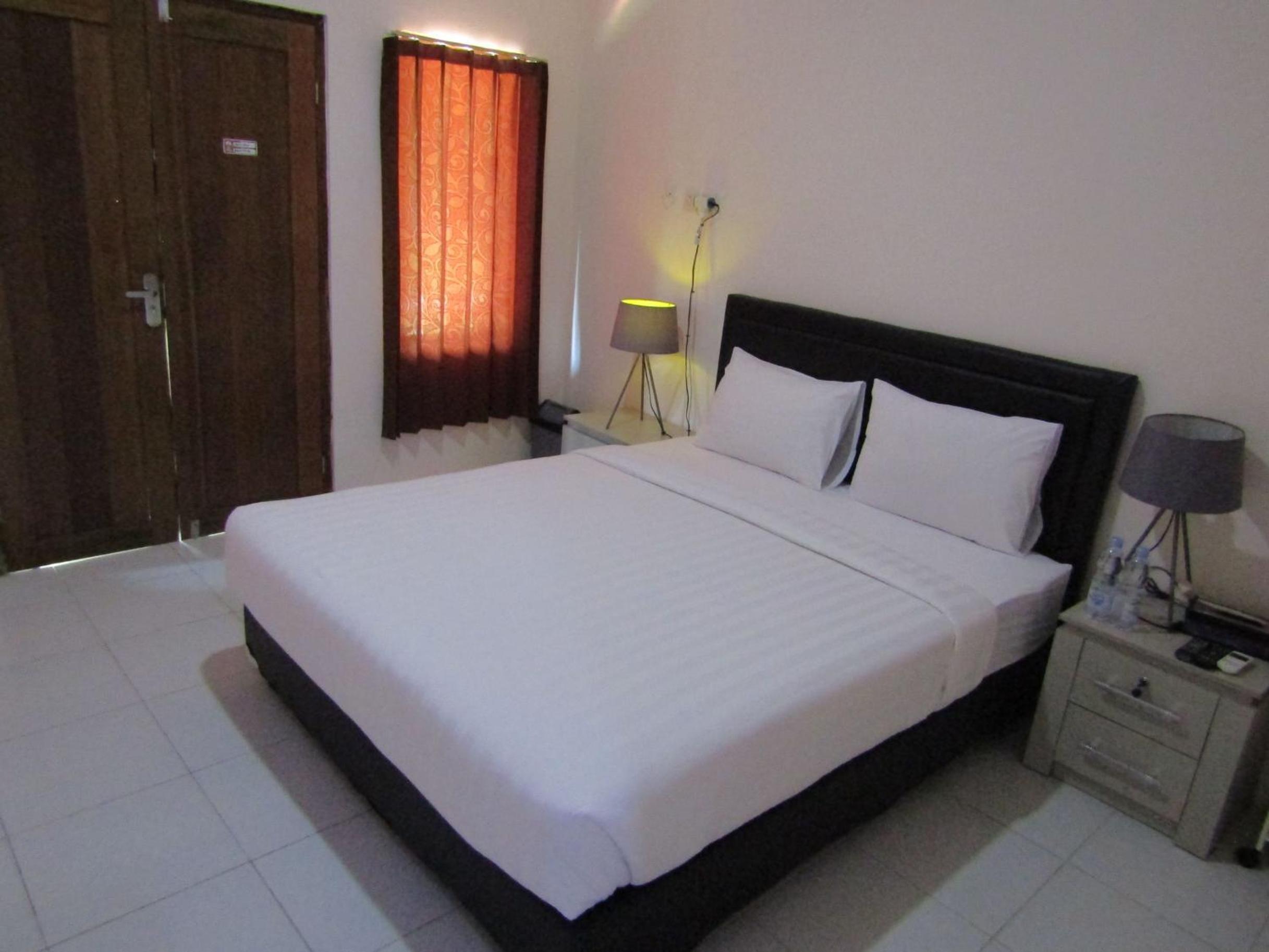 Deluxe Room - Photo 4