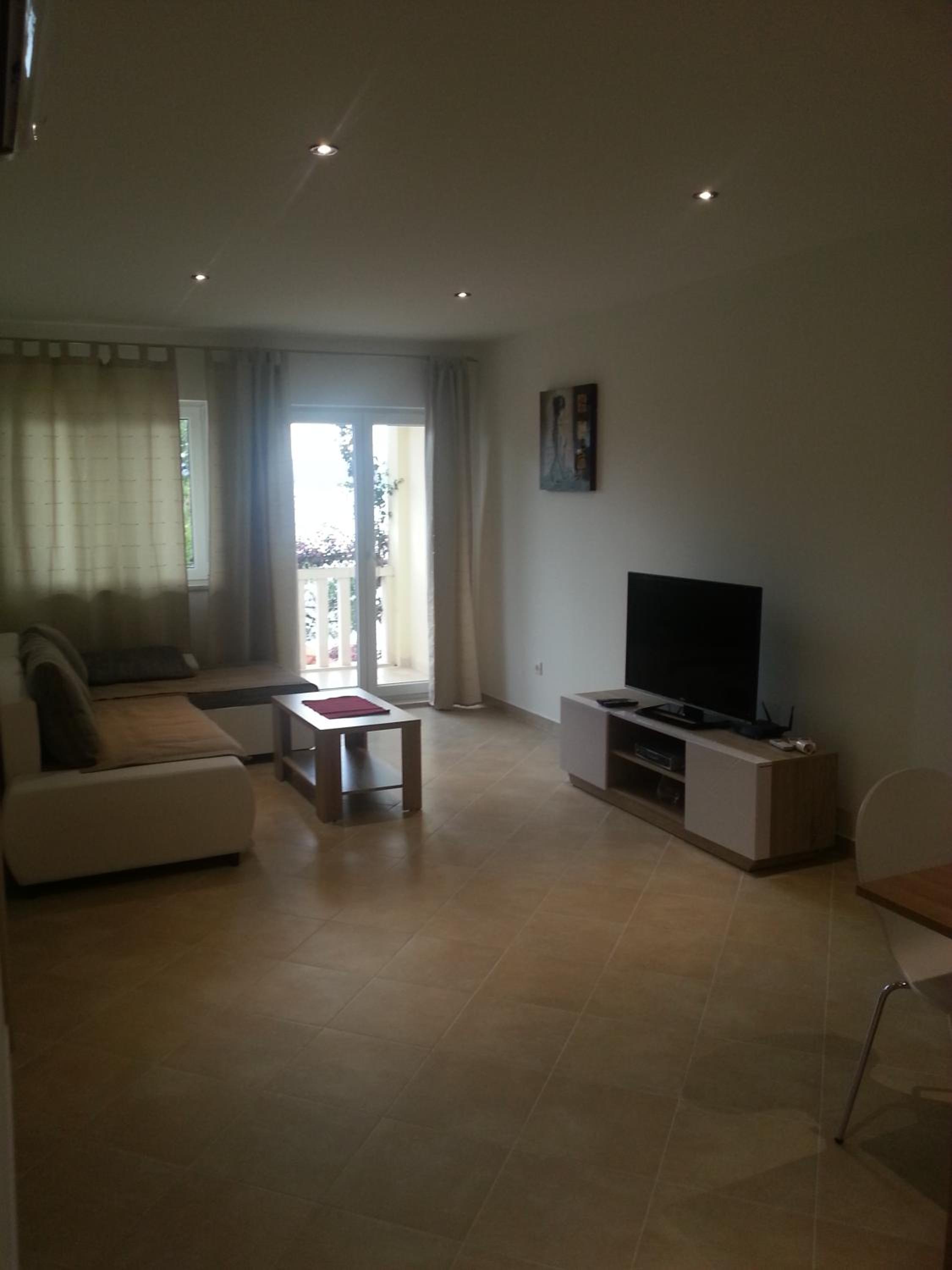 Two-Bedroom Apartment with Balcony and Sea View