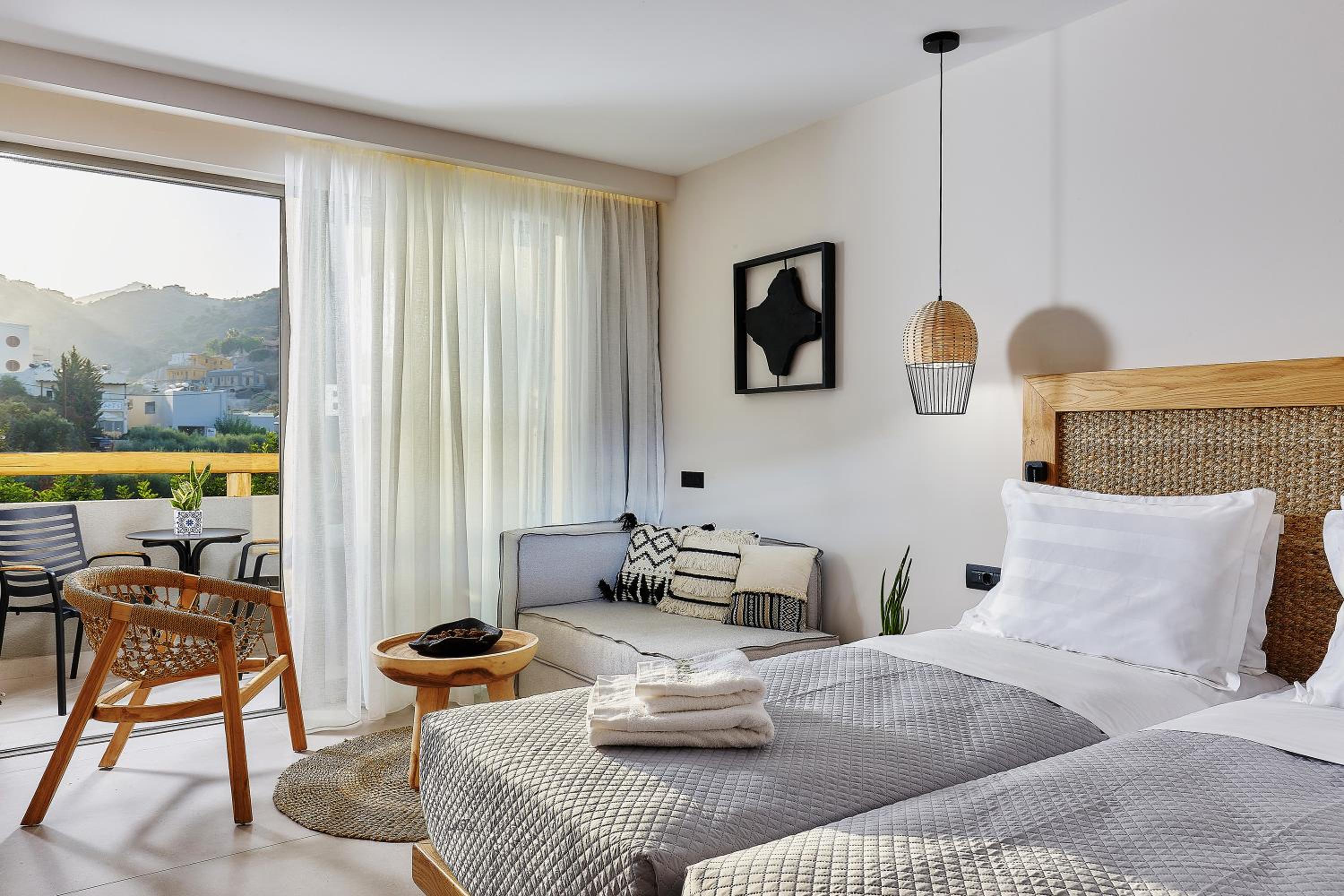 Junior Suite with Garden or Side Sea View