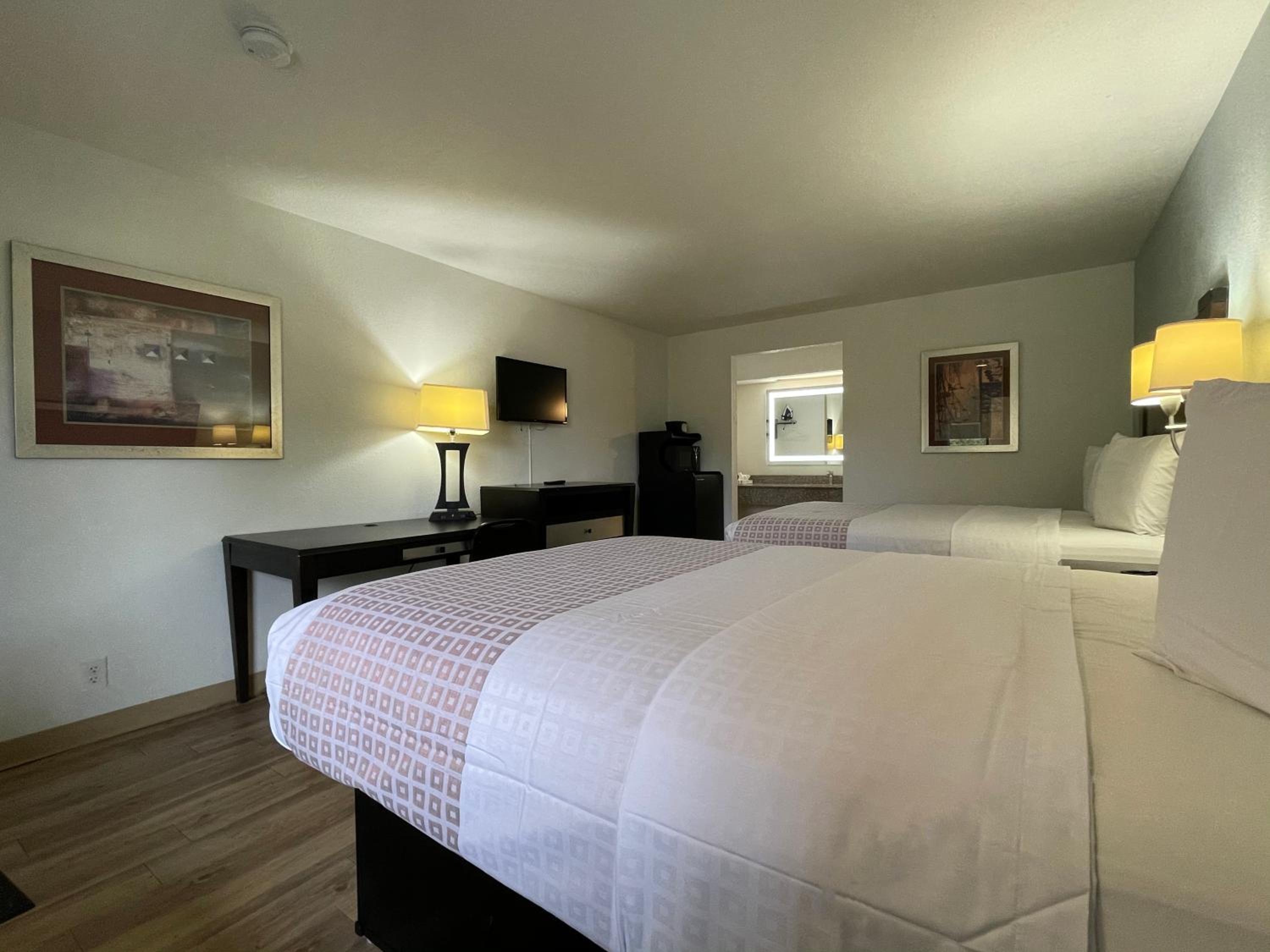 Queen Room with Two Queen Beds - Photo 1