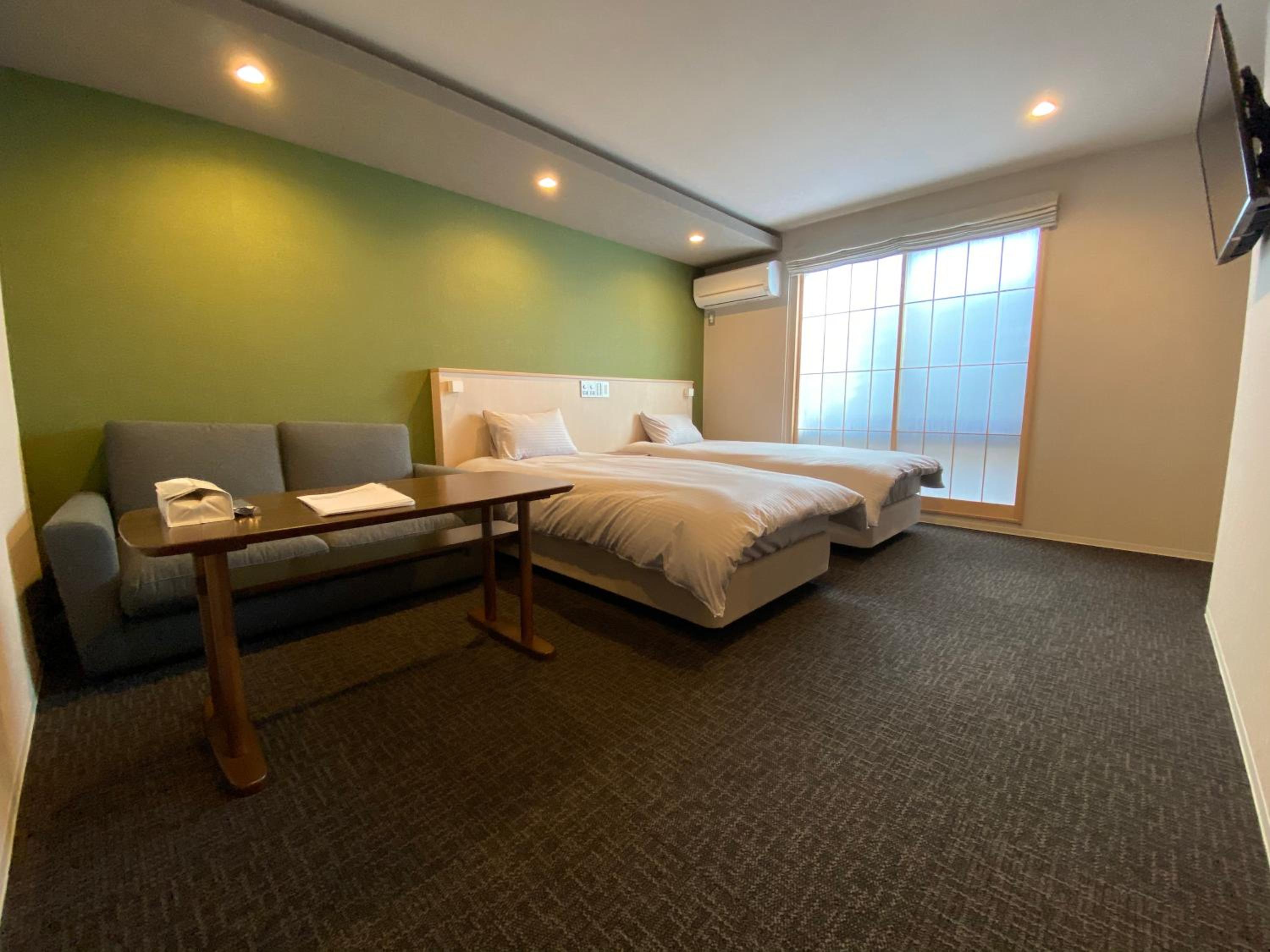 Deluxe Twin Room - Photo 25