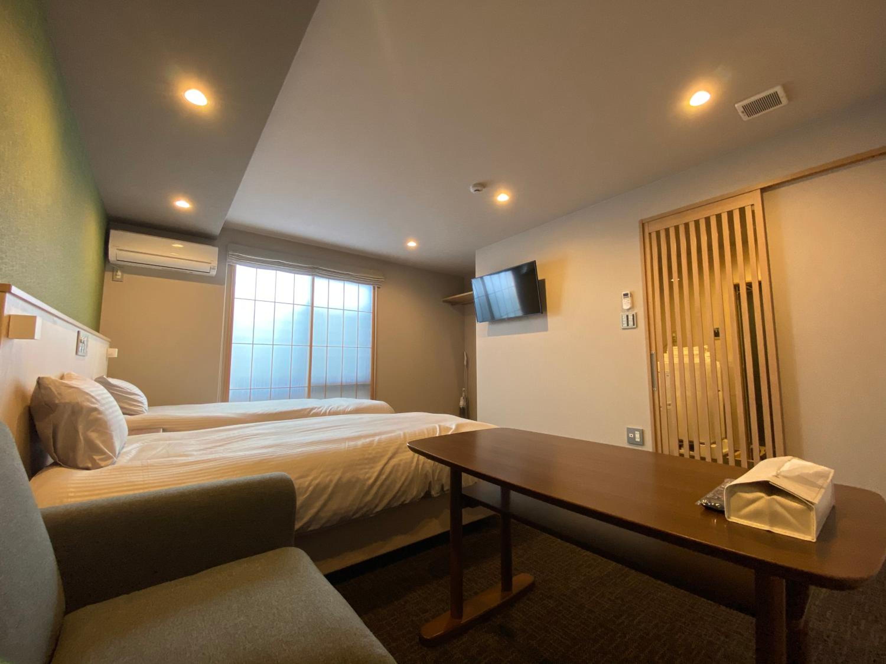 Deluxe Twin Room - Photo 24