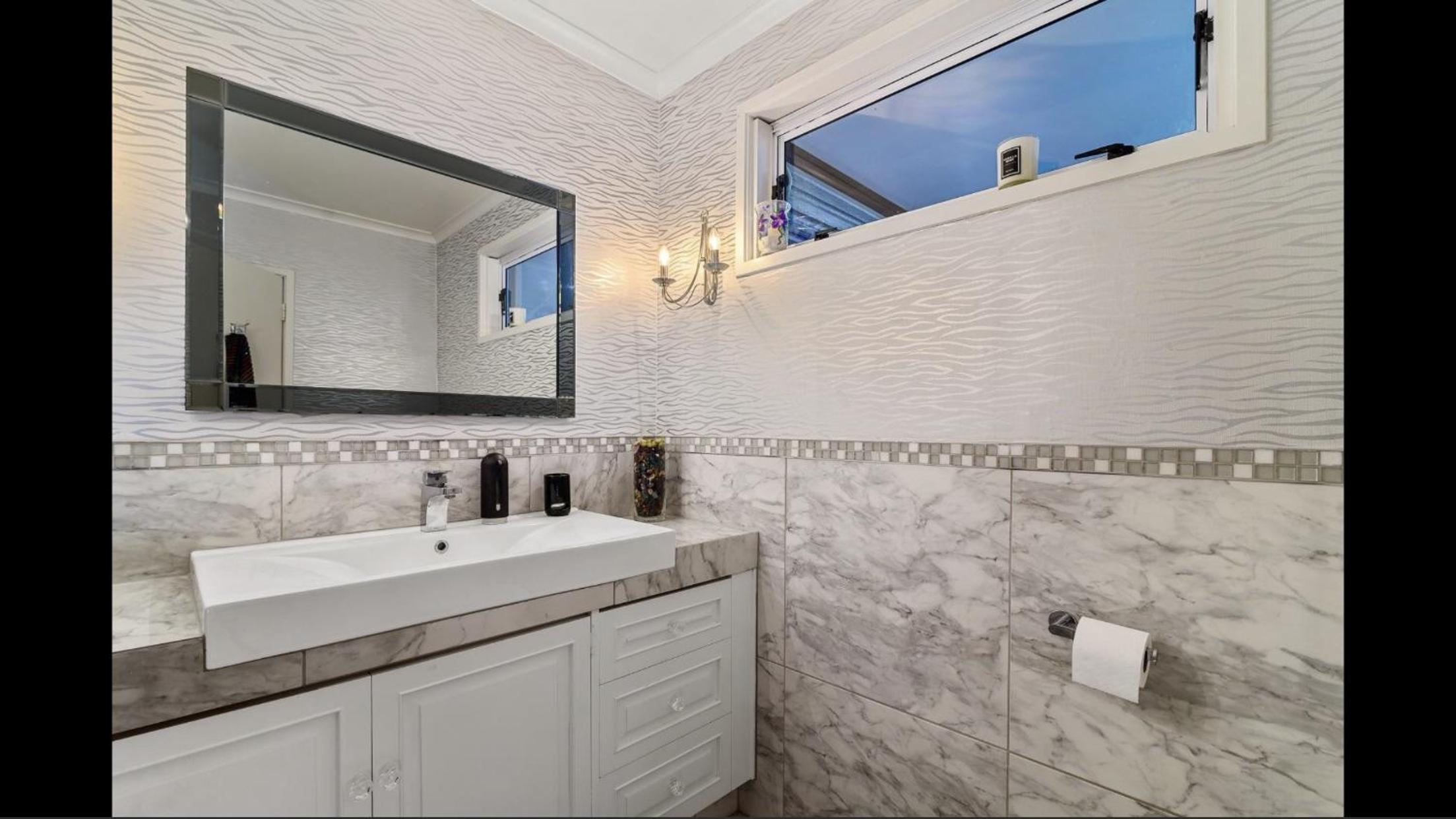Four-Bedroom House - Photo 25