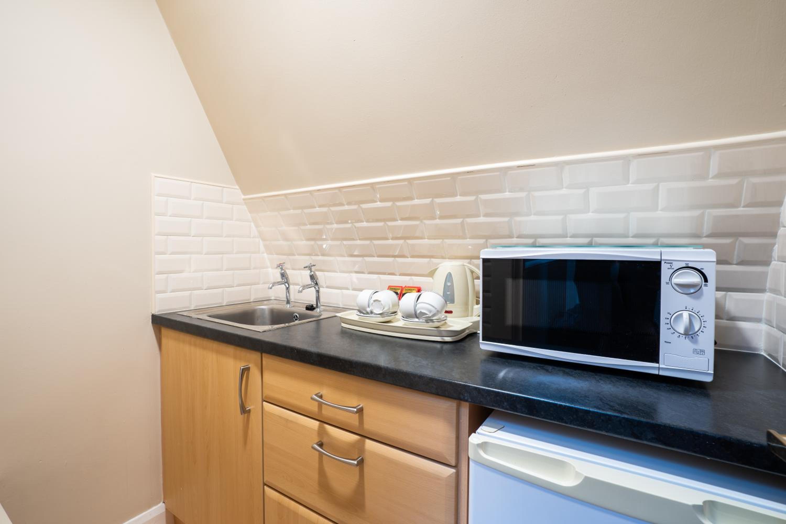 Standard Family Room with Mini Kitchen - Photo 12