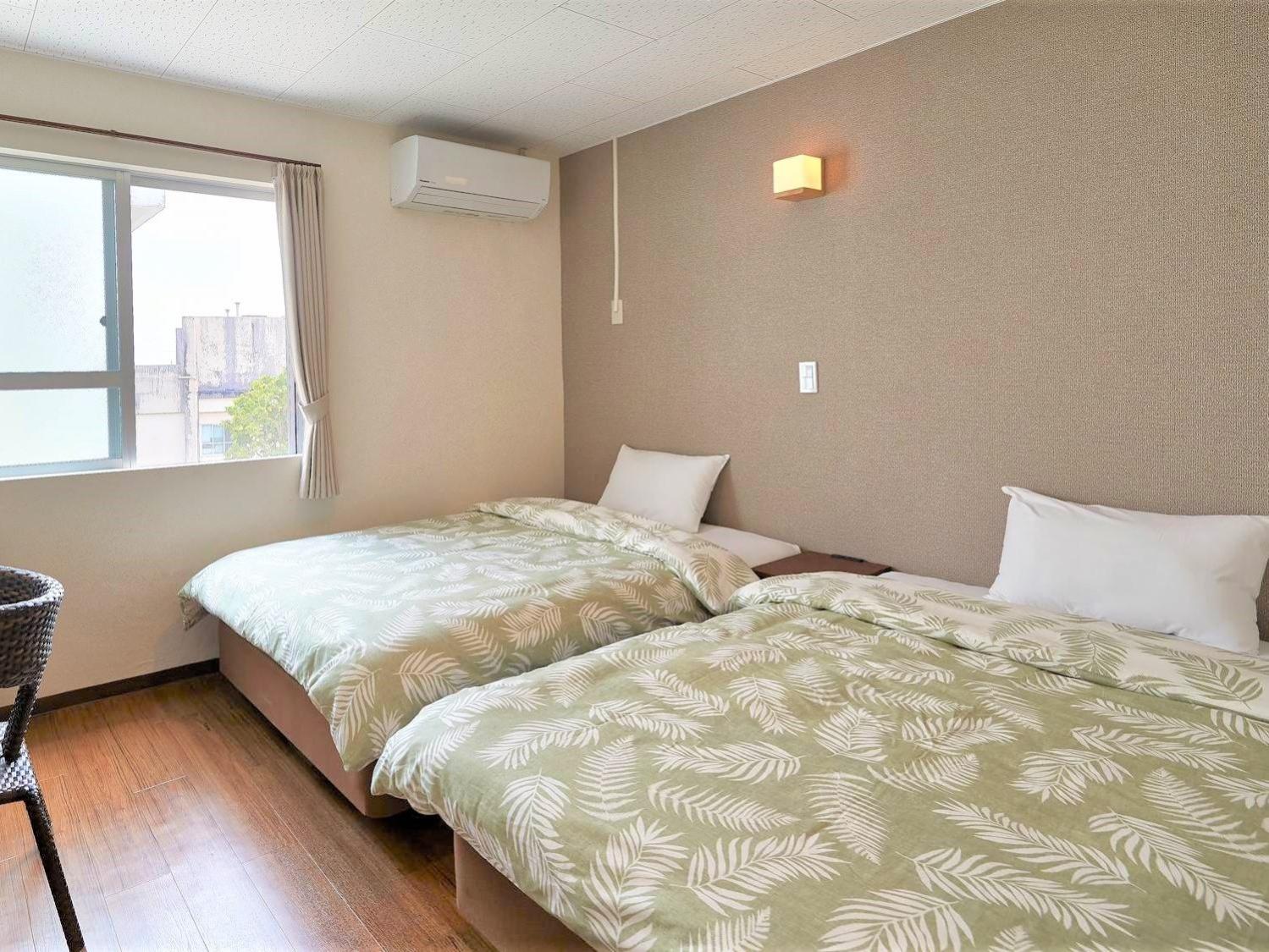 Twin Room - Photo 1