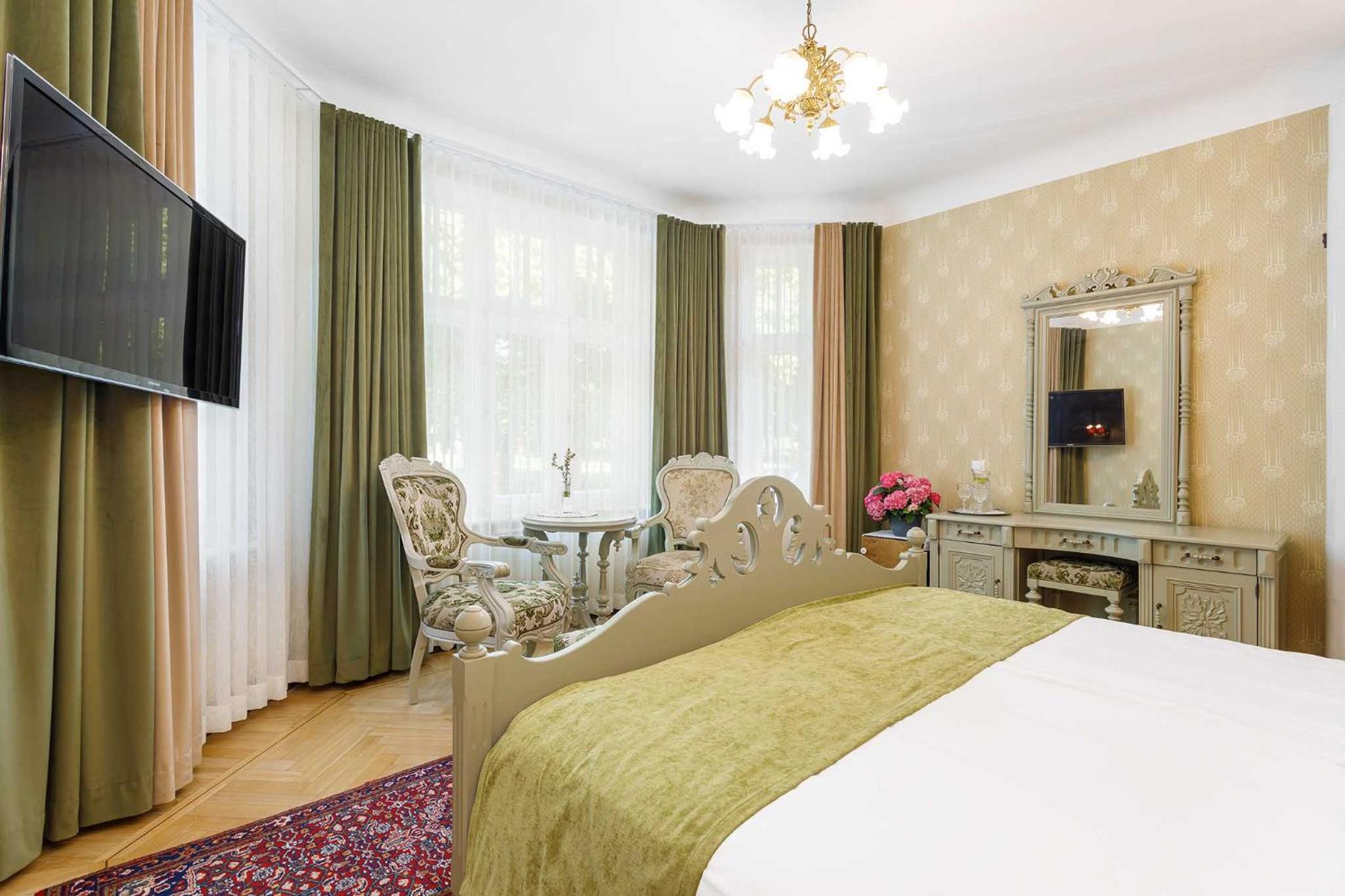 Deluxe Quadruple Room - Photo 10