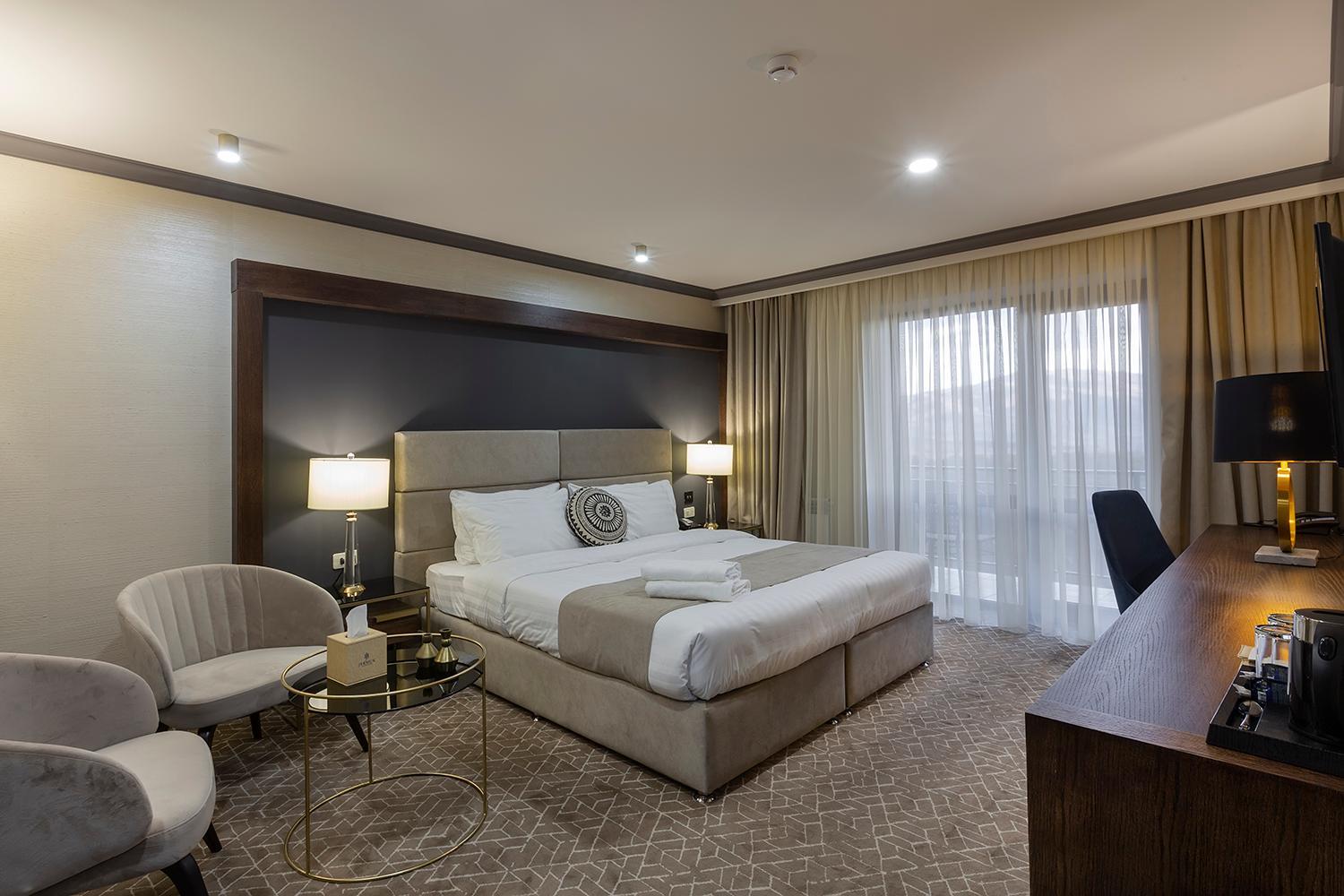 King Suite with Balcony-Treatment included