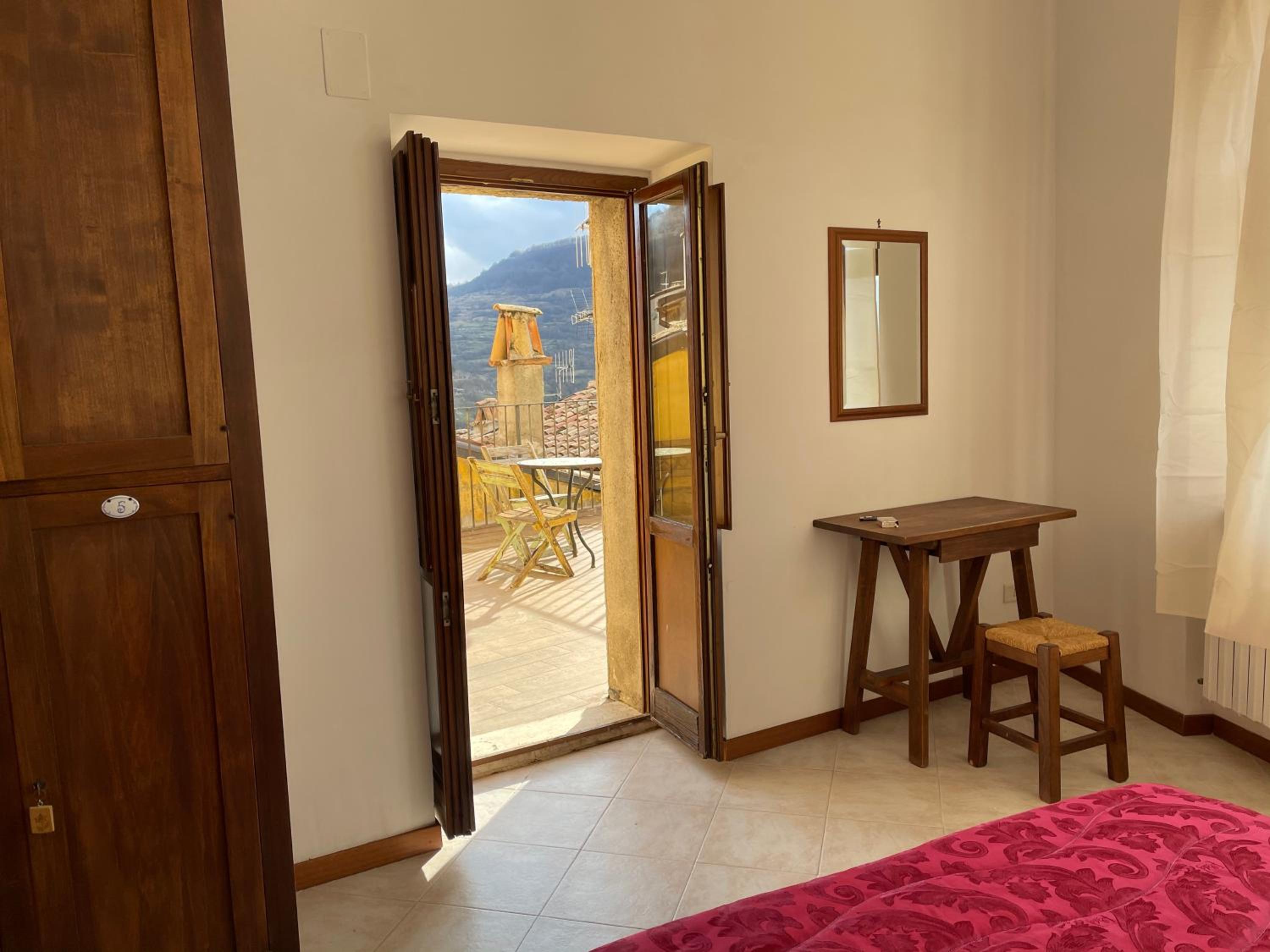 Quadruple Room with Private External Bathroom - Photo 1