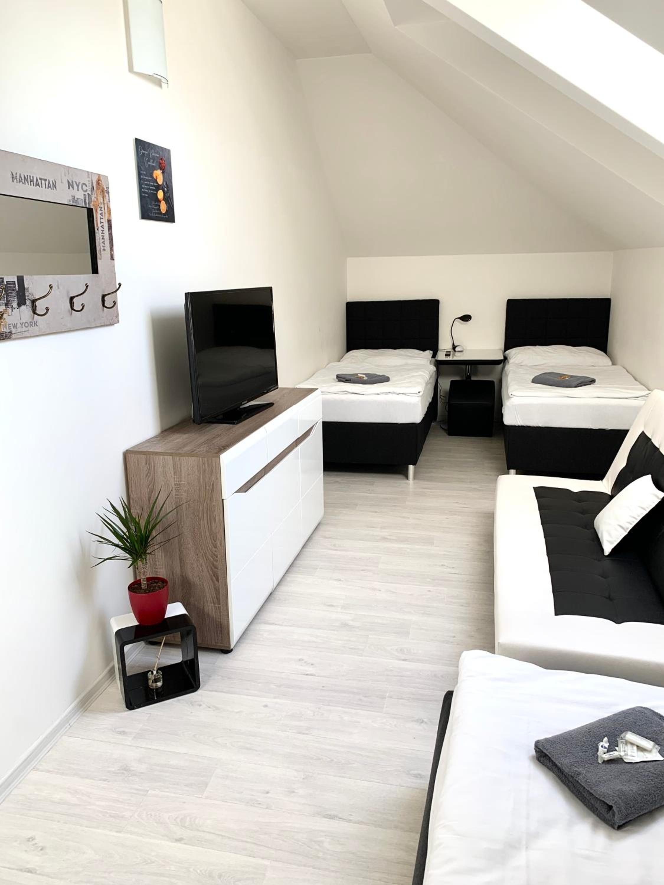Deluxe Triple Room - Photo 2