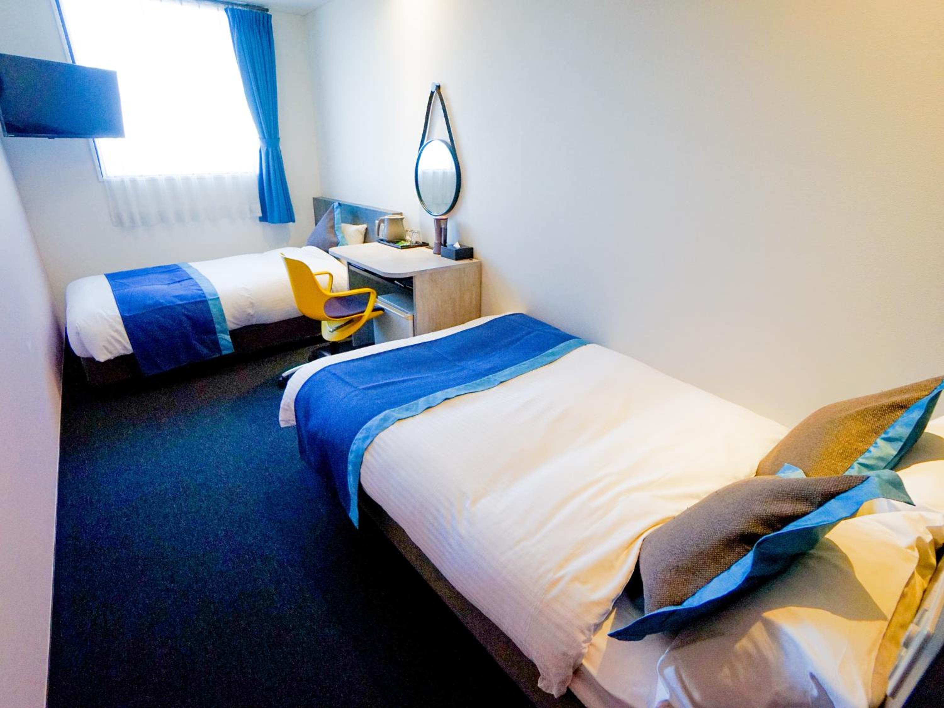 Economy Twin Room - Photo 6