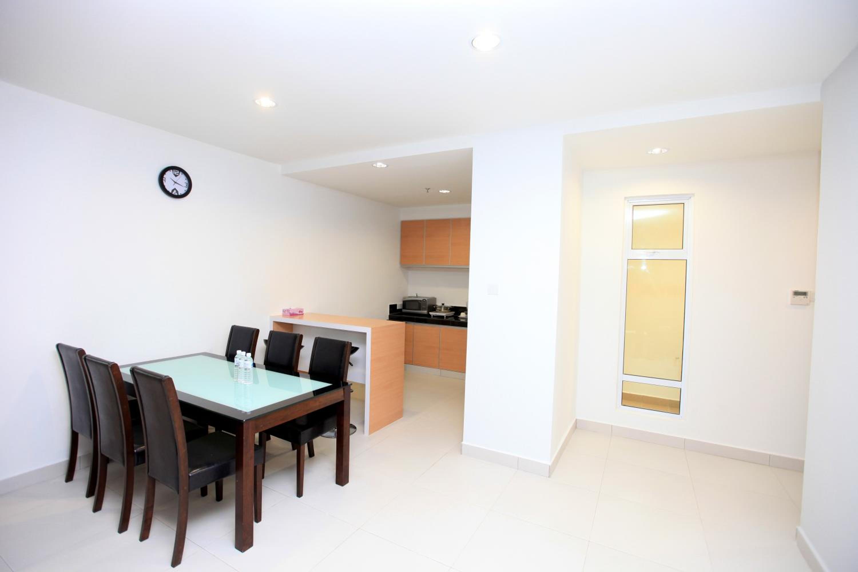 Three-Bedroom Apartment - Photo 2