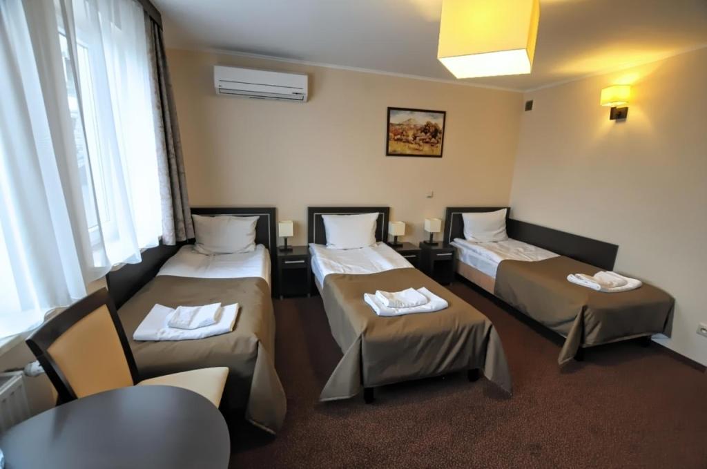 Triple Room - Photo 1