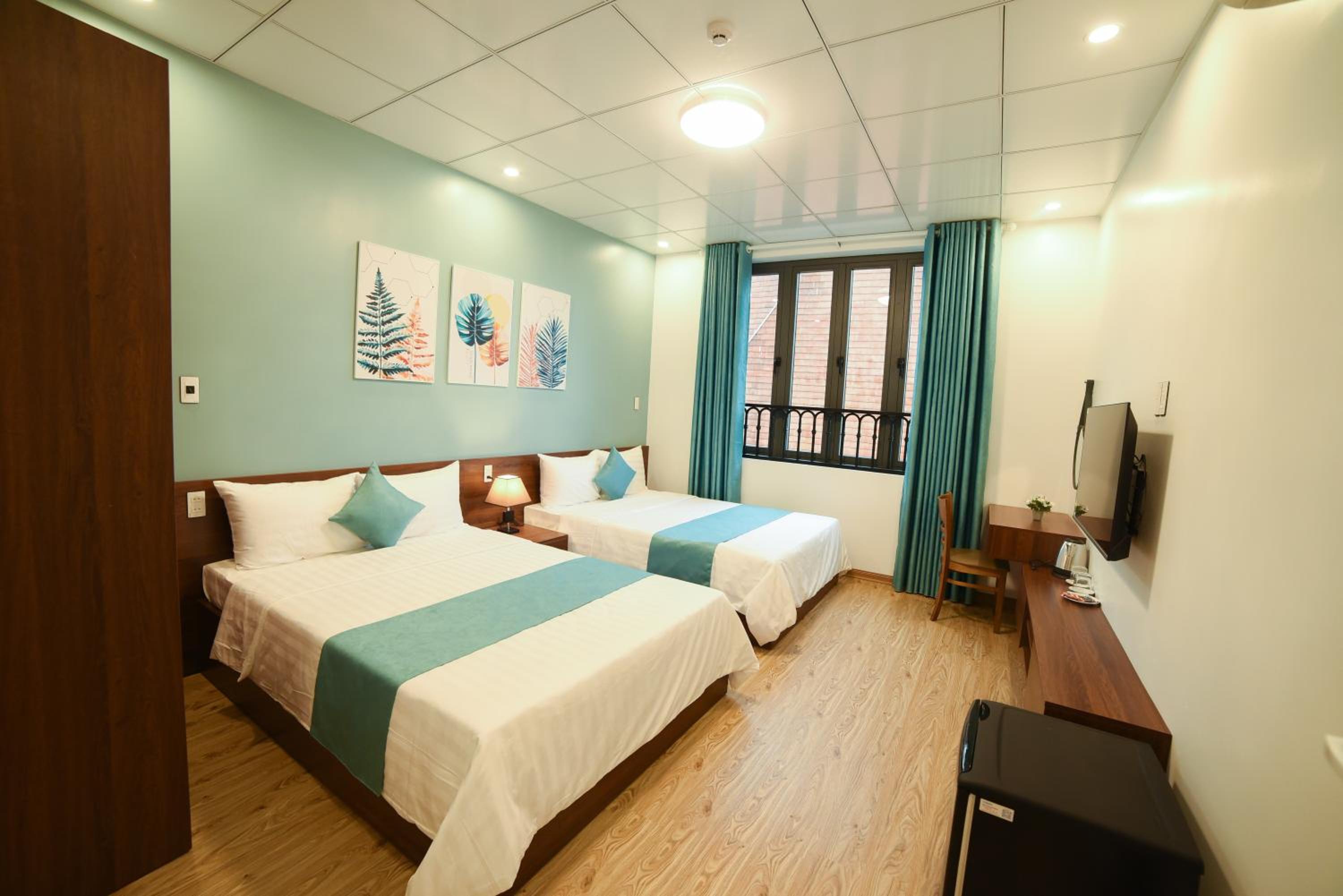 Deluxe Quadruple Room - Photo 2
