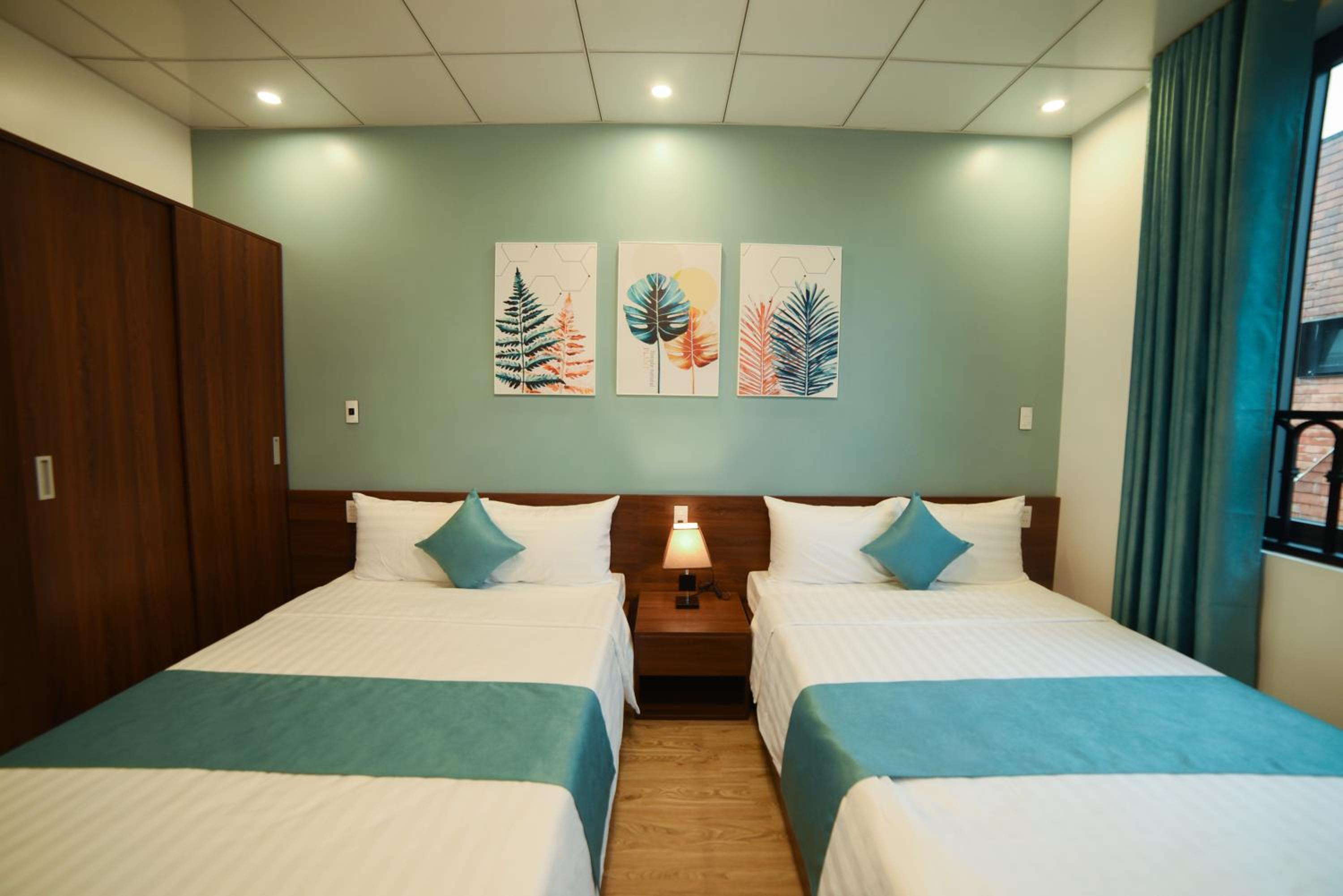 Deluxe Quadruple Room - Photo 3