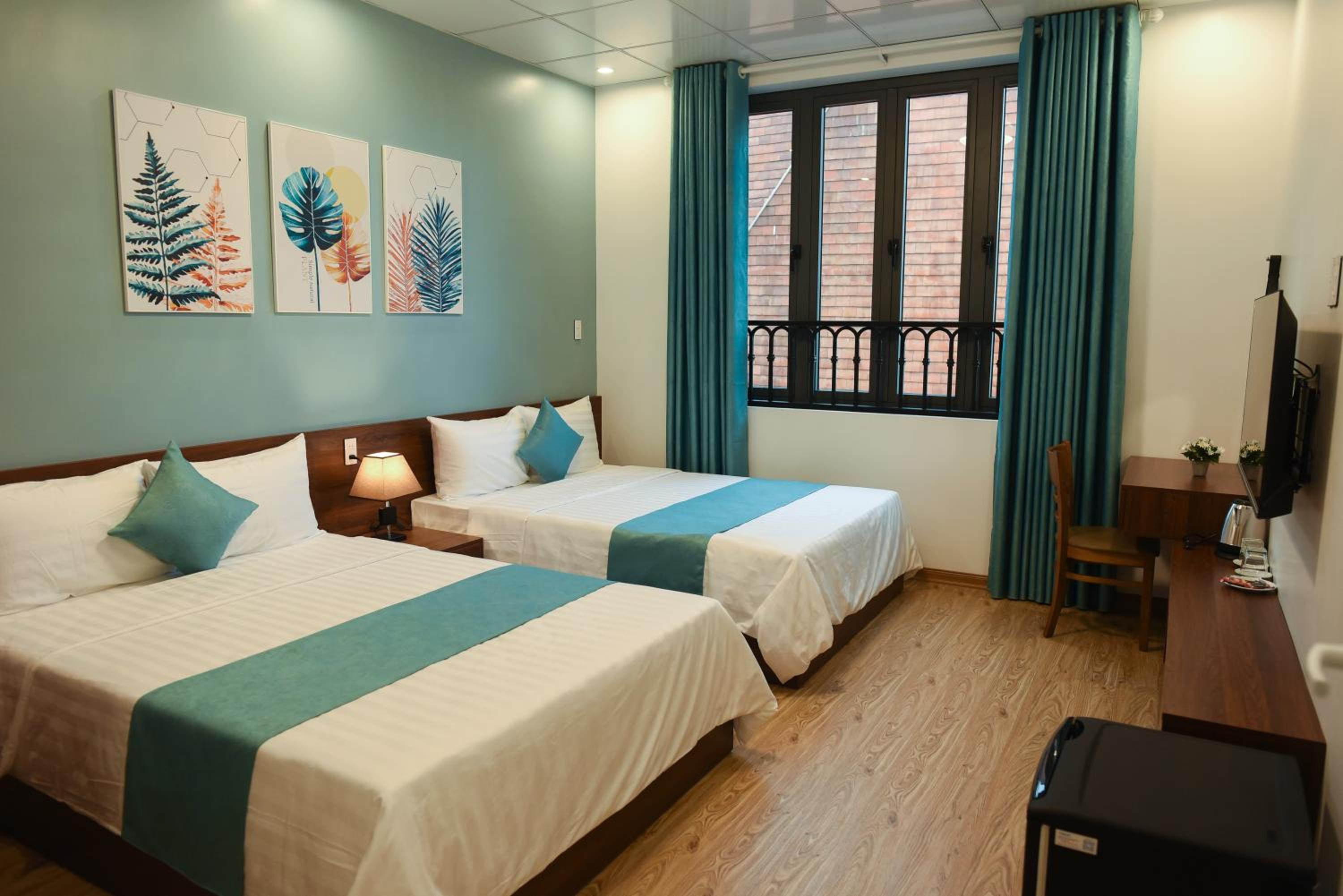 Deluxe Quadruple Room - Photo 6