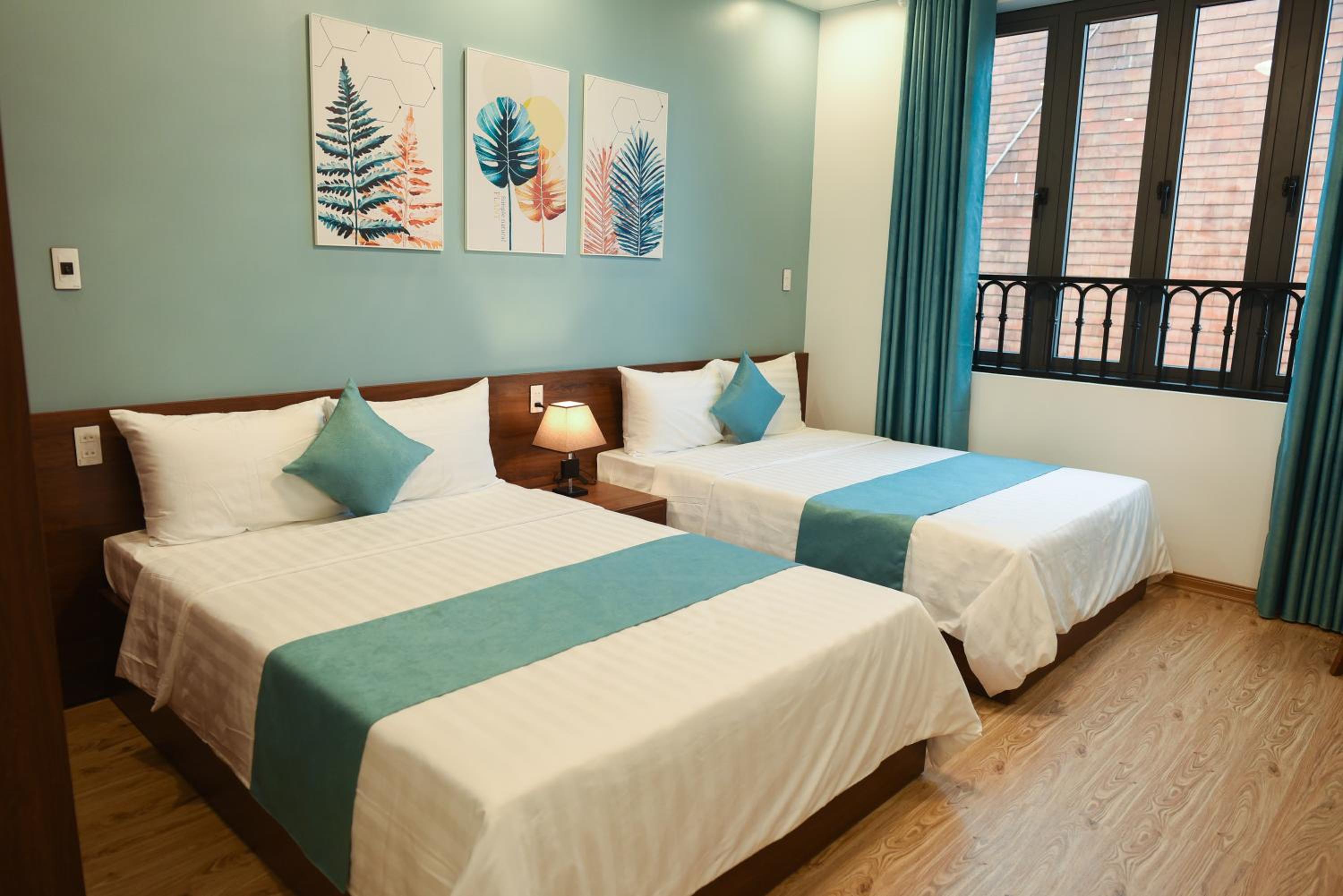 Deluxe Quadruple Room - Photo 4