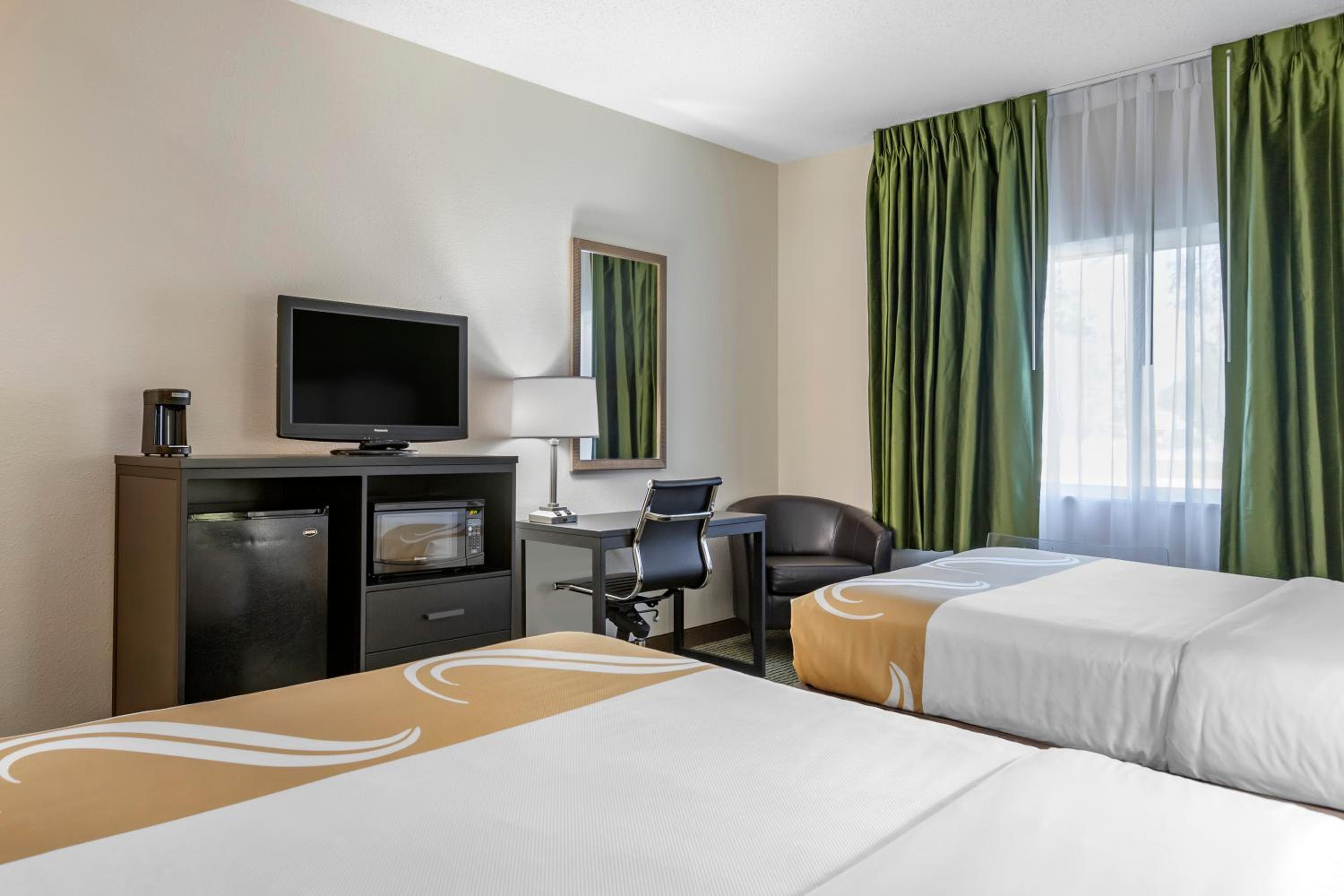 Queen Room with Two Queen Beds - Non-Smoking - Photo 1