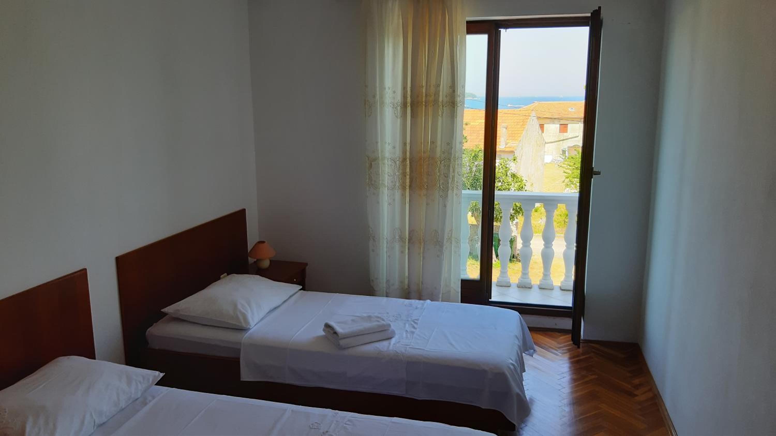Two-Bedroom Apartment with Balcony and Sofa Bed photo 1