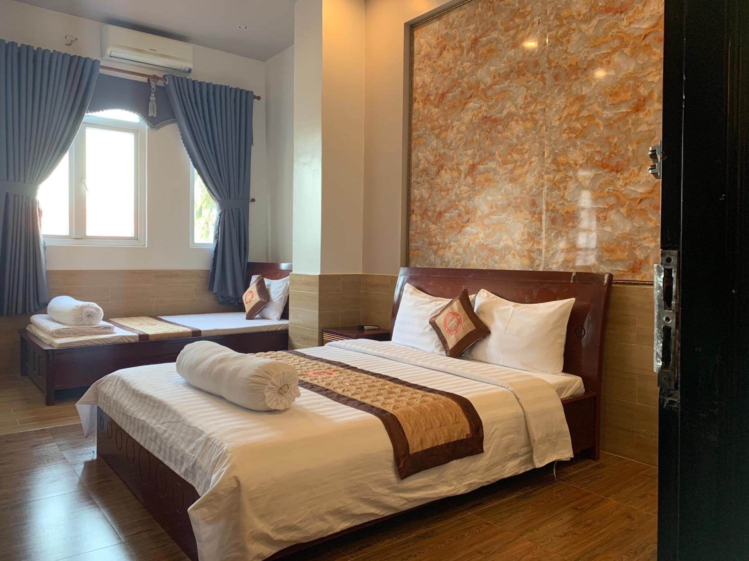 Standard Triple Room - Photo 7