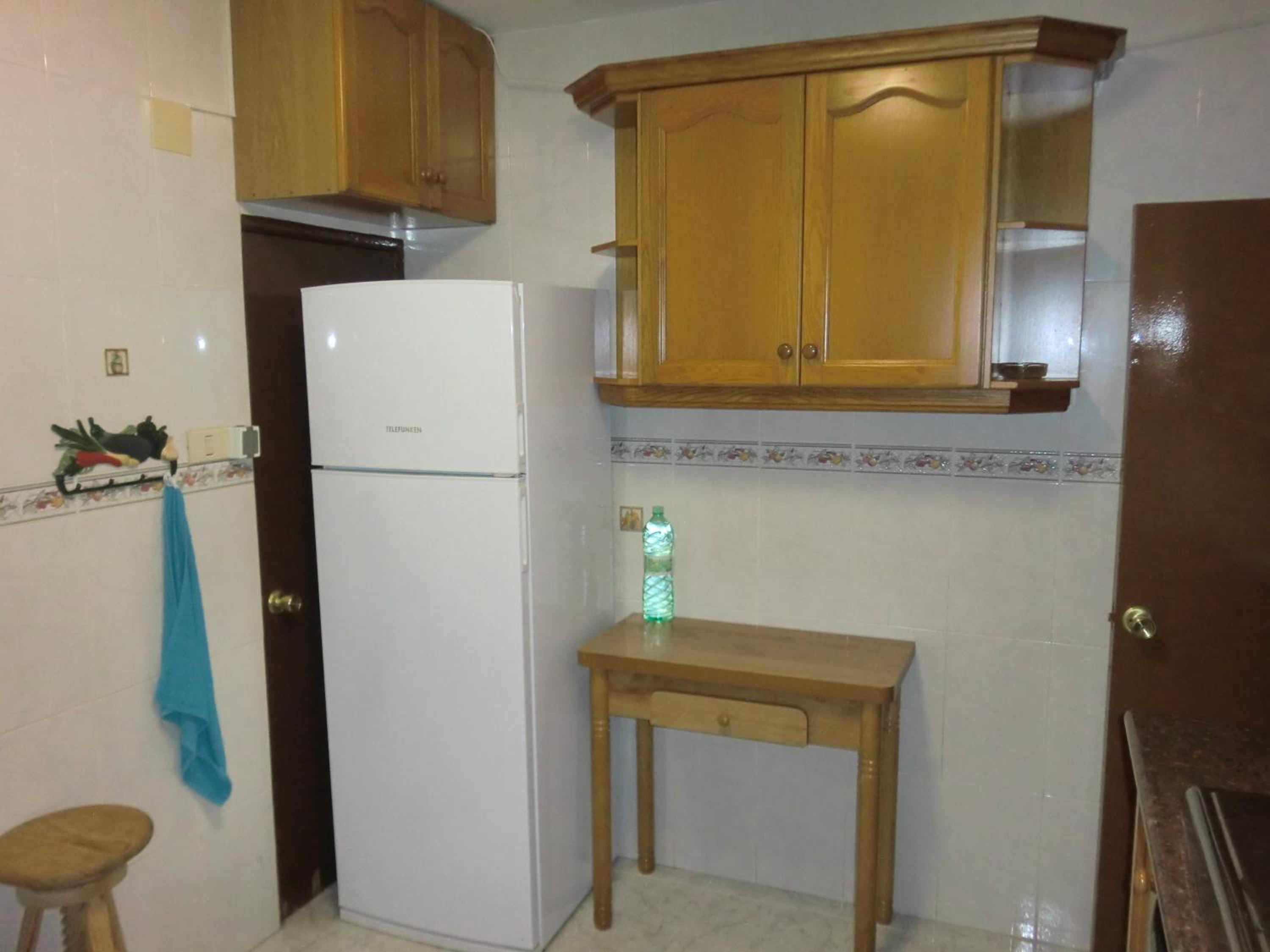 Three-Bedroom Apartment photo 2