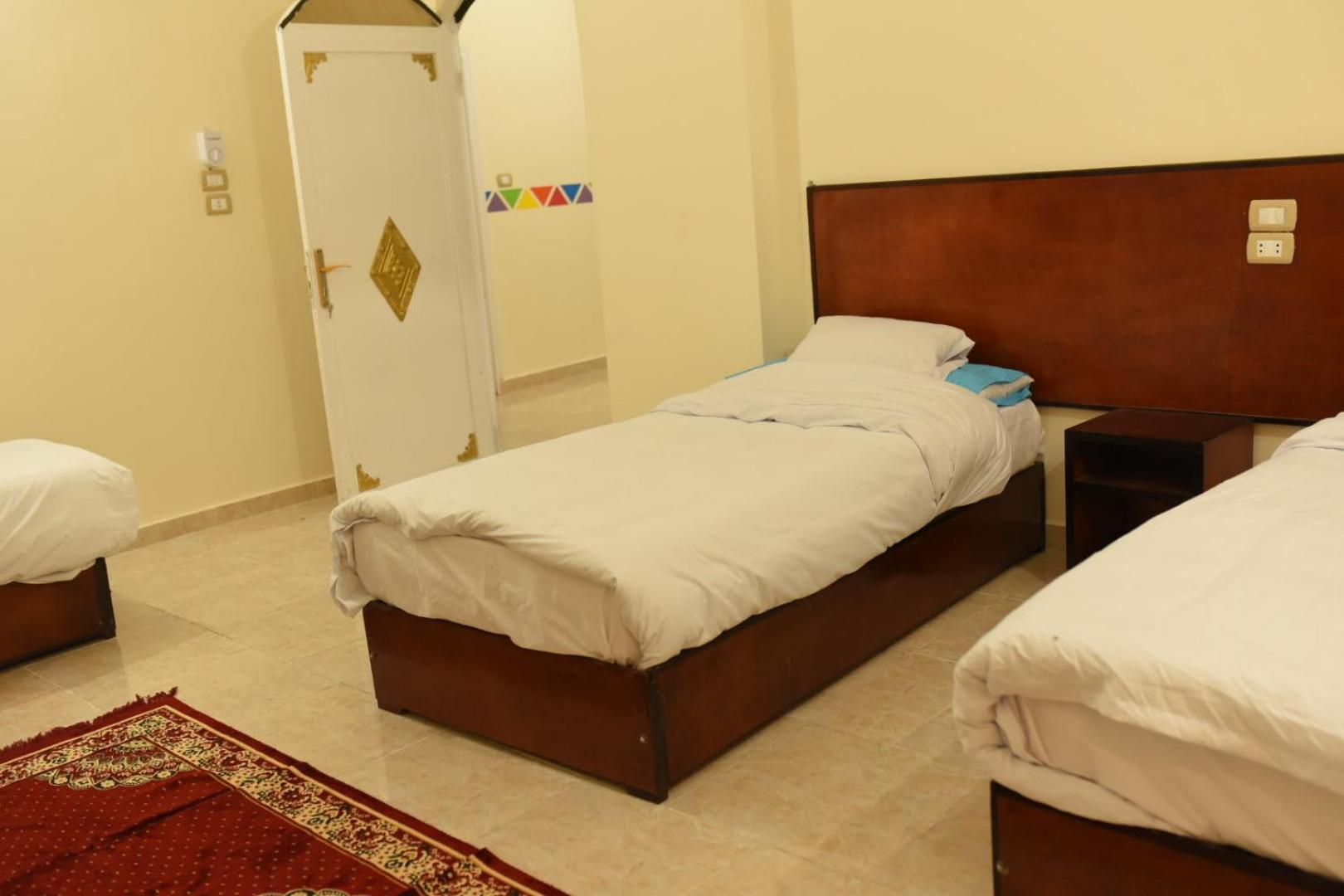 Triple Room with Private External Bathroom - Photo 9