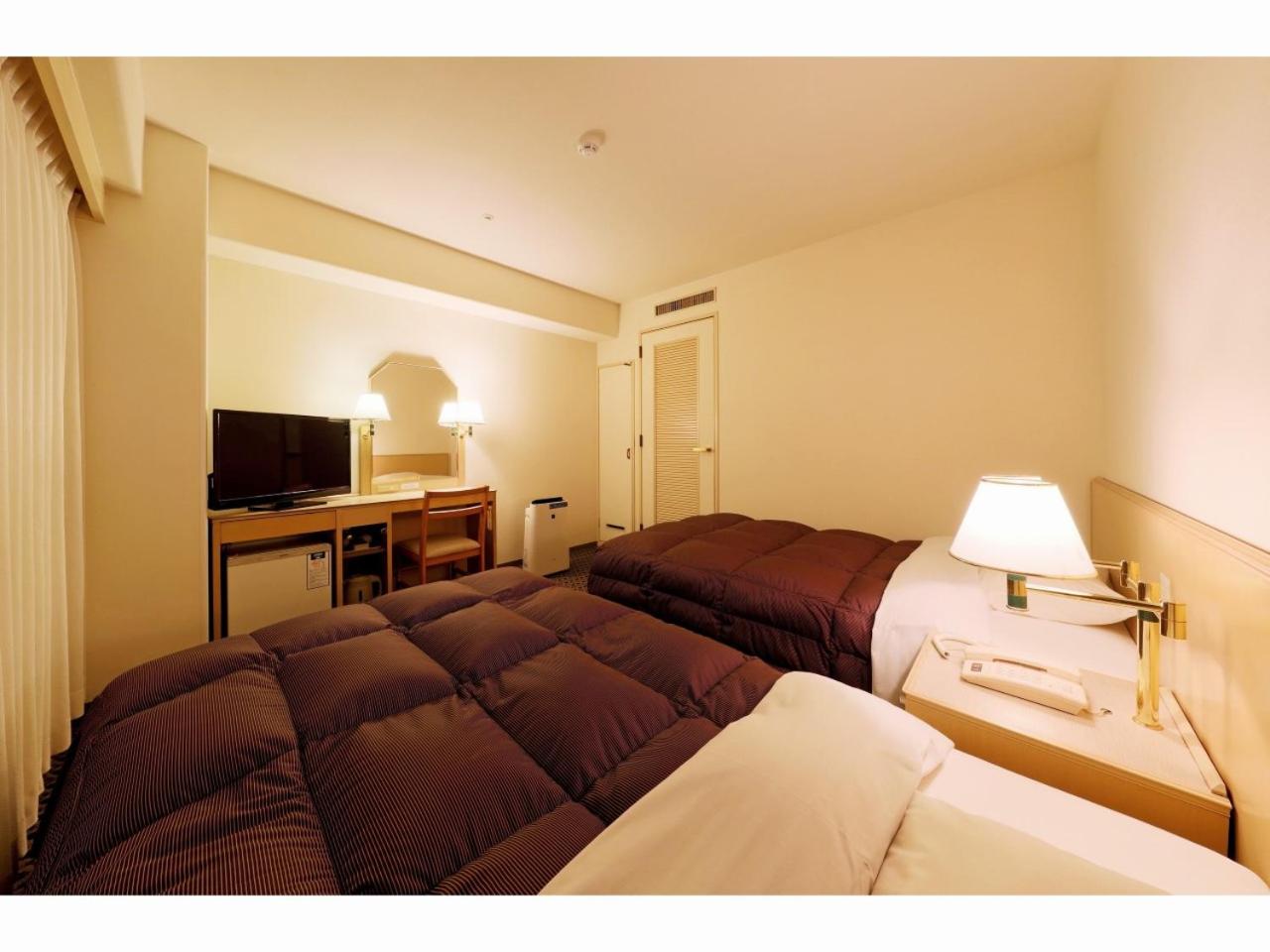 Twin Room - Non-Smoking - Photo 13