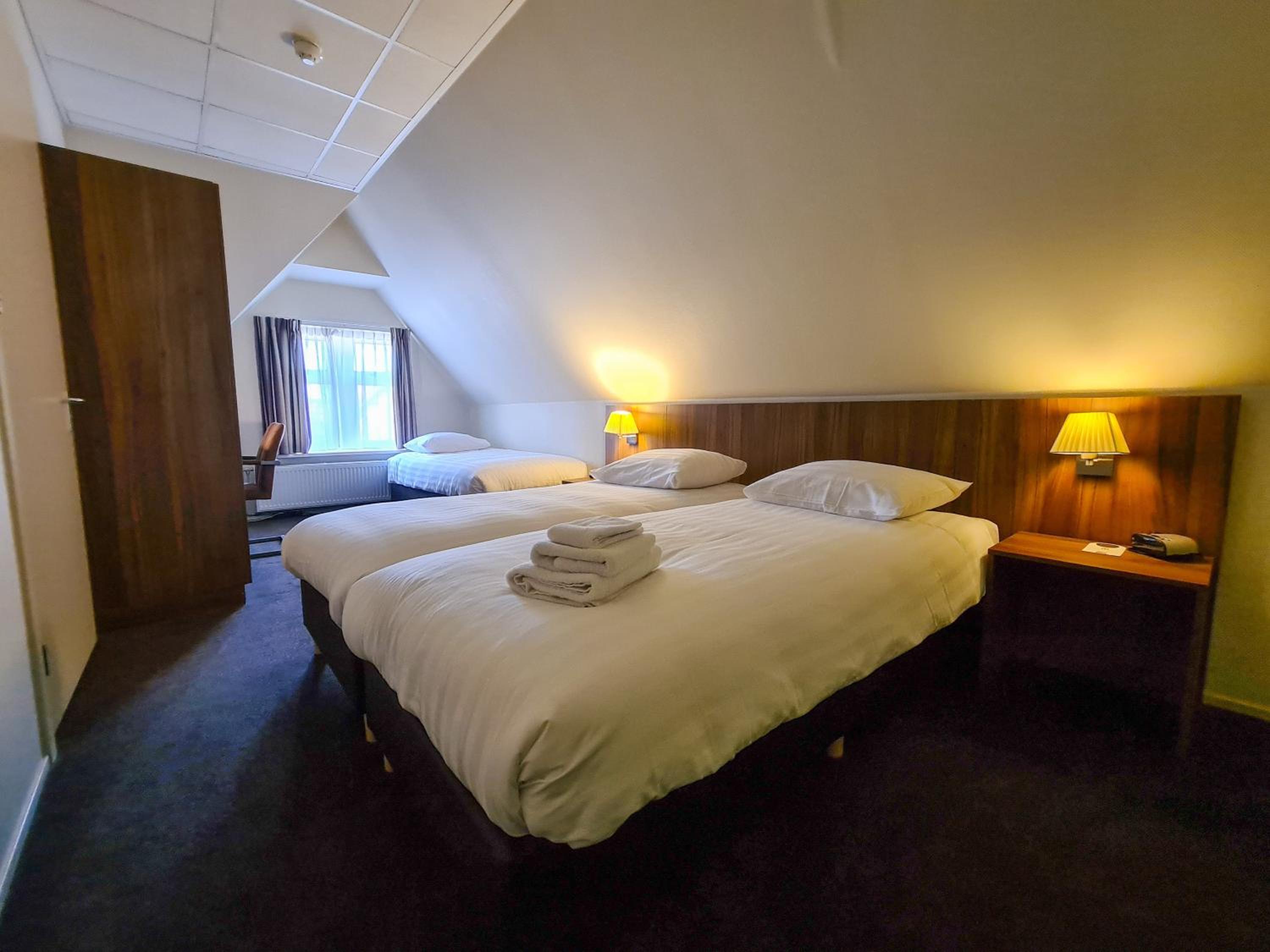 Basic Triple Room photo 2