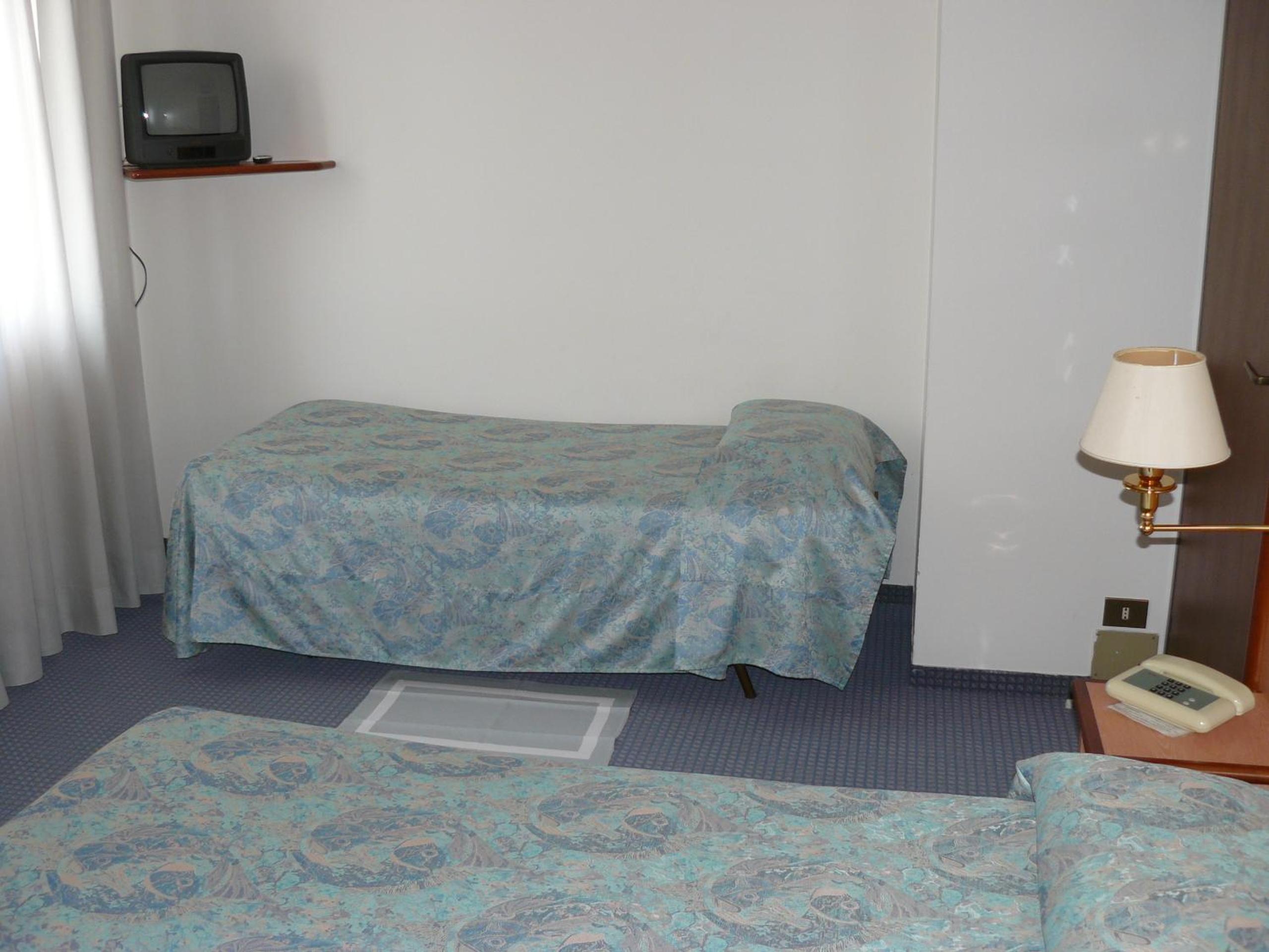 Economy Triple Room - Photo 1