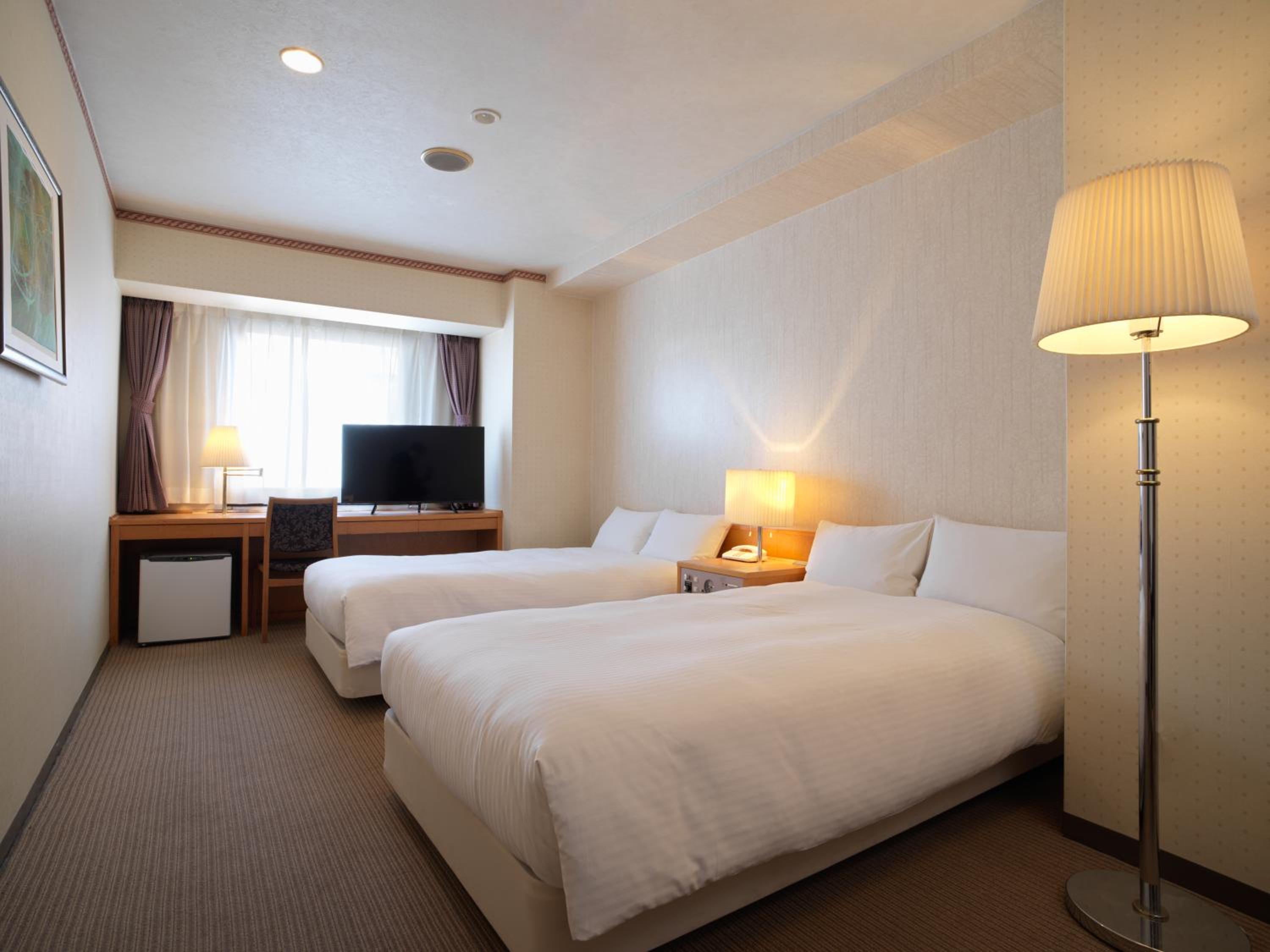 Twin Room - Non-Smoking - Photo 1